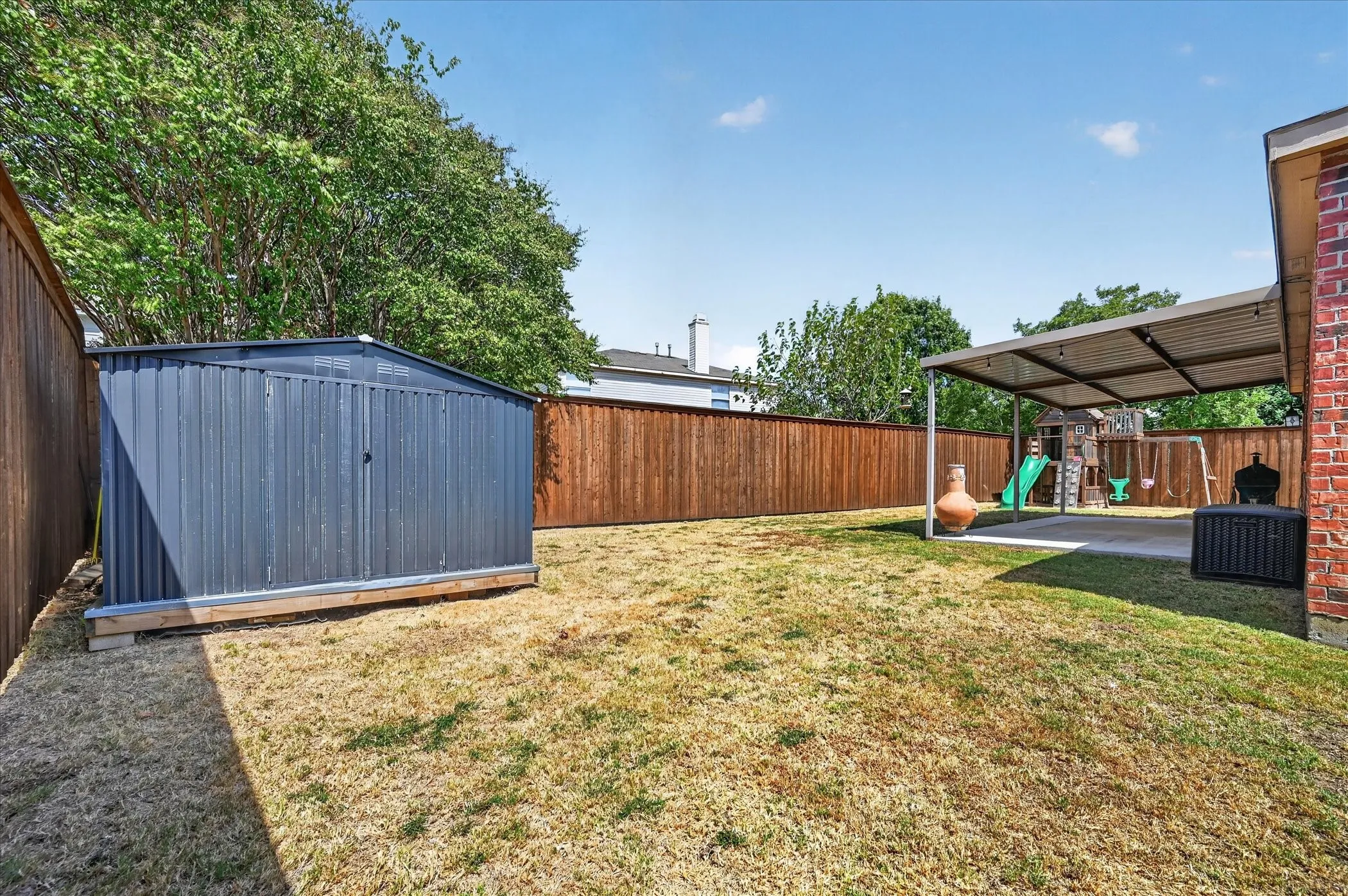 Storage shed in backyard.