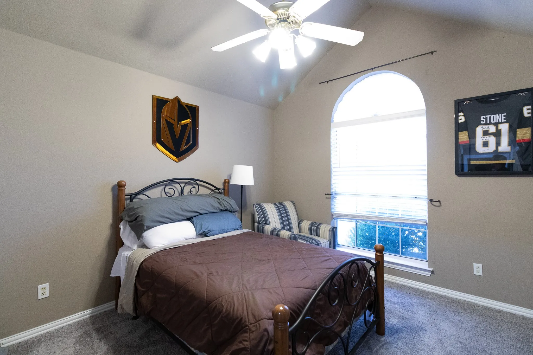 Vaulted ceiling with an attached ceiling fan