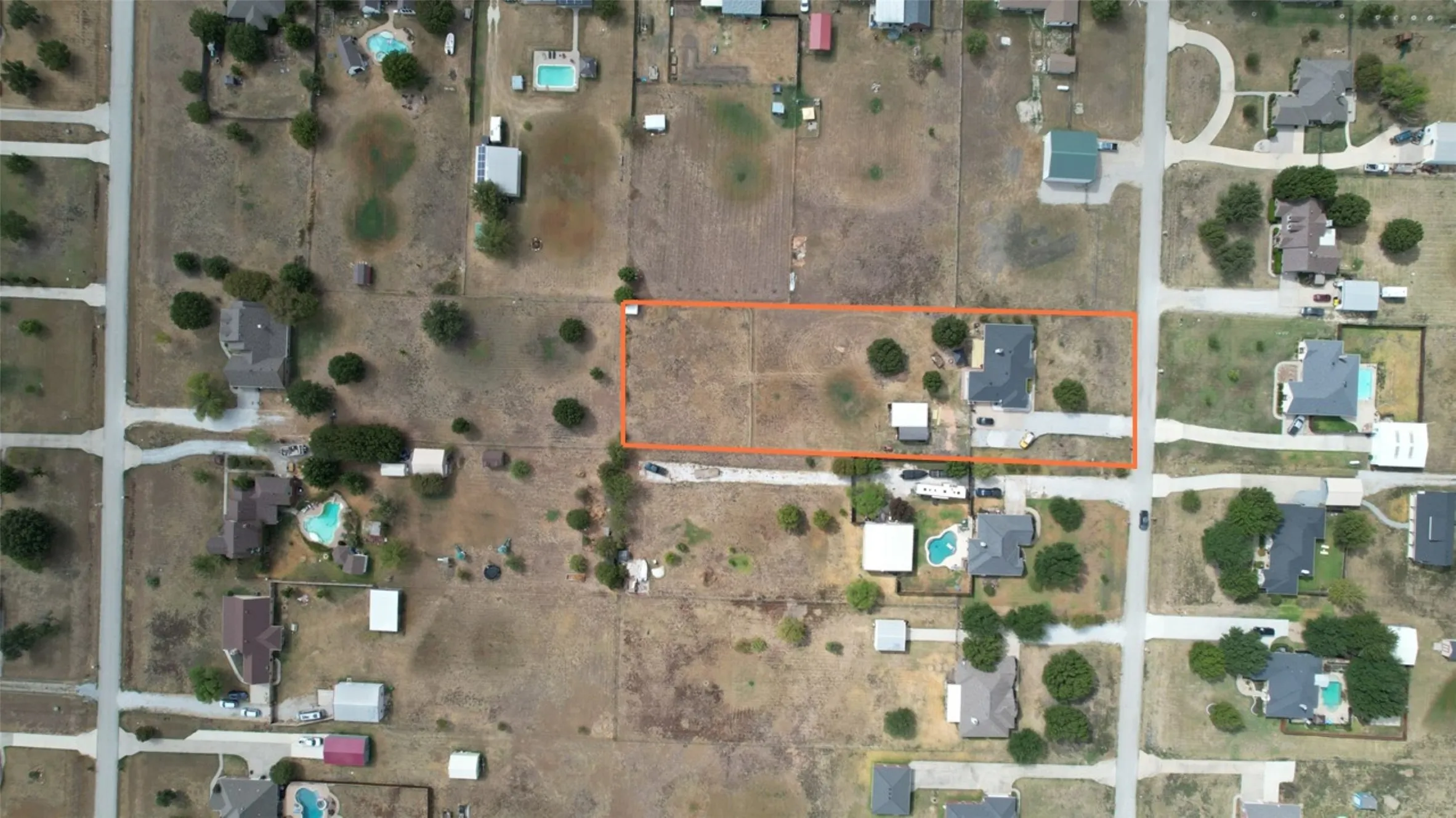 Aerial Survey. Outlining the property boundaries and surrounding land features