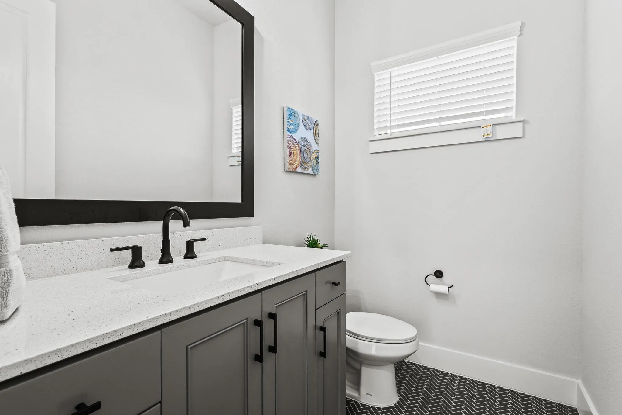 Bathroom with vanity and tile patterned flooring