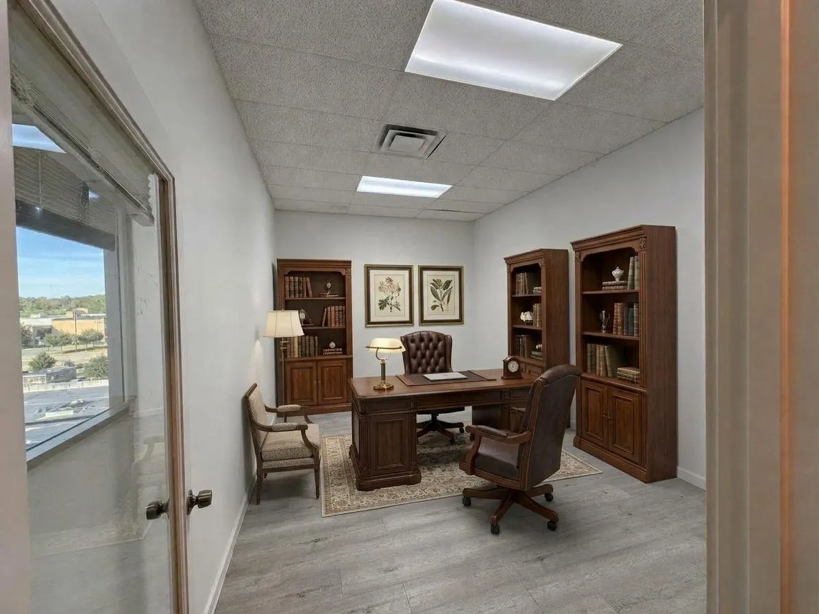 Recessed fluorescent lighting, wood-finish flooring, full-height windows, and glass entry door