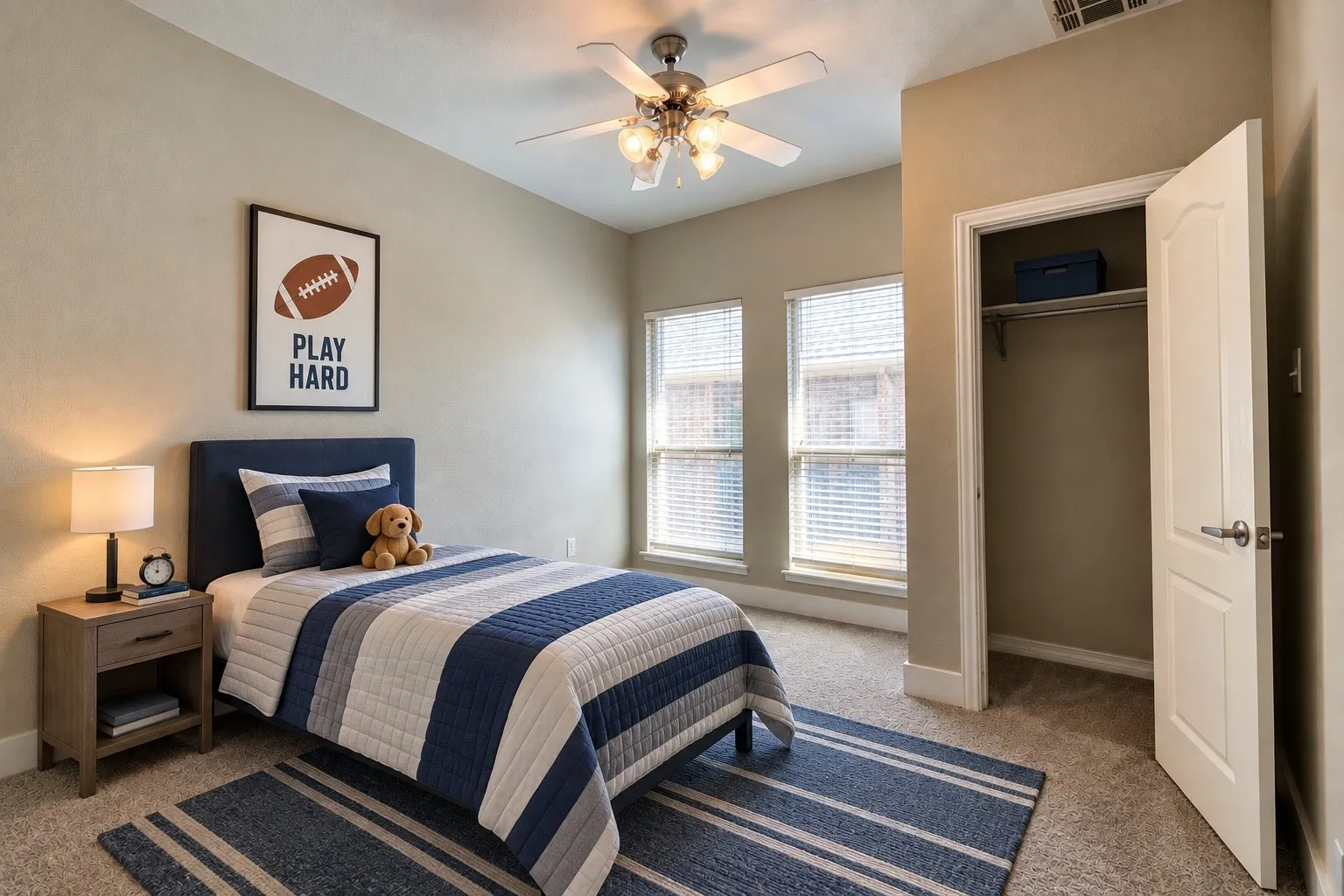 Neutral wall finishes, recessed windows, built-in closet, and ceiling fan