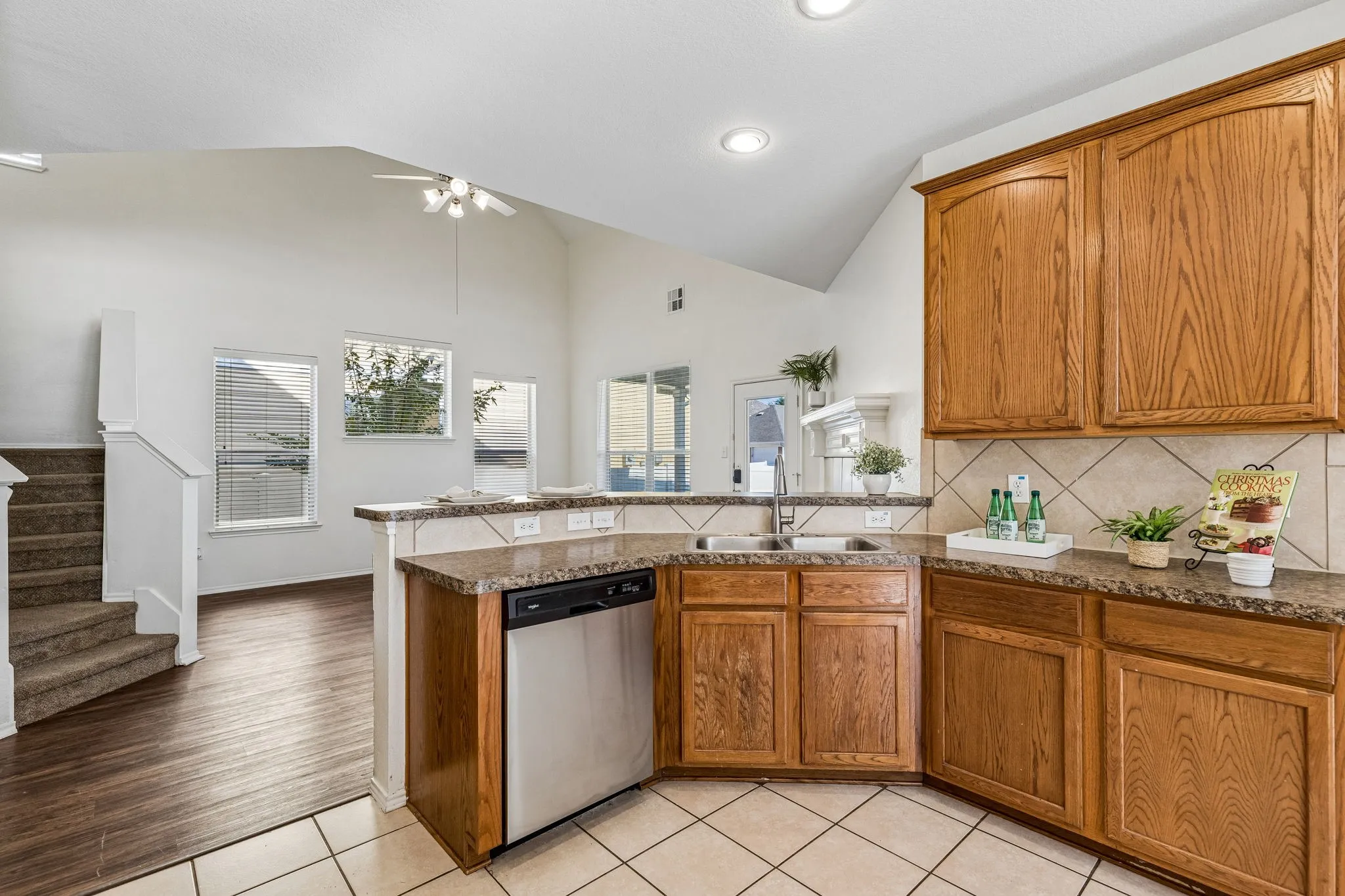 Designed for everyday living, the kitchen connects effortlessly to both the breakfast nook and formal dining room.
