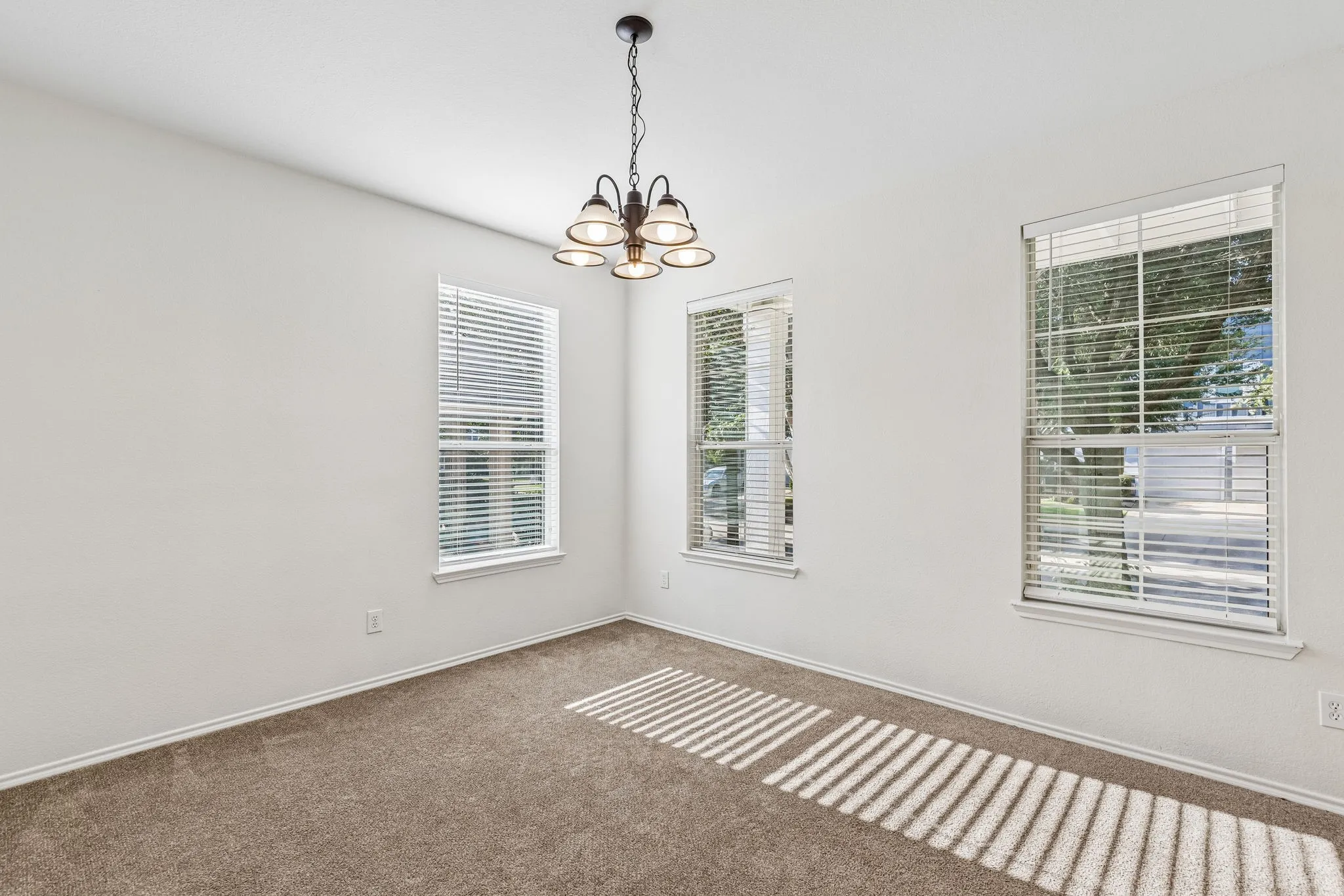 The formal dining room offers an inviting setting for holiday gatherings, celebrations and everyday meals.