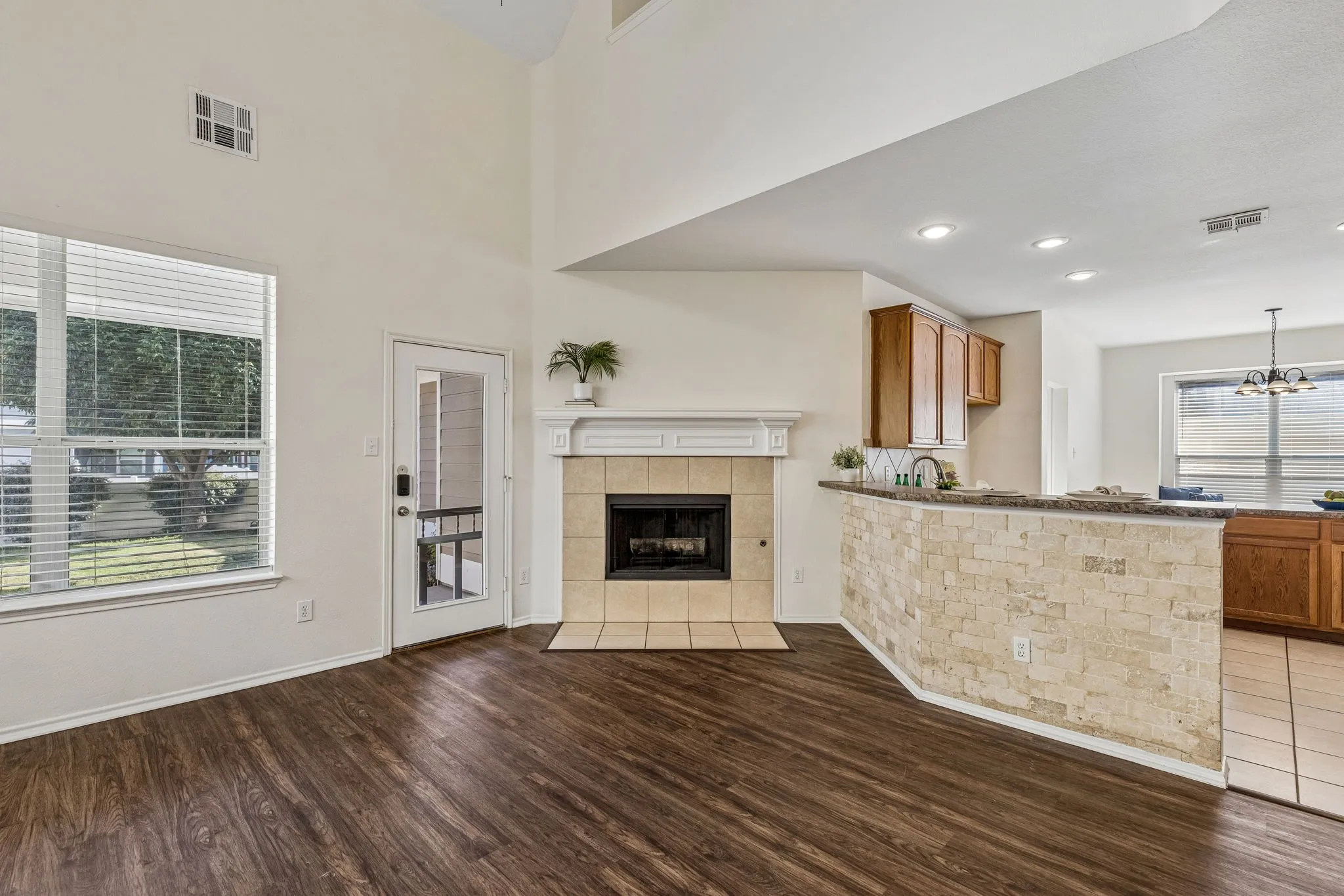The breakfast bar provides additional seating and enhances the home's open, functional layout.