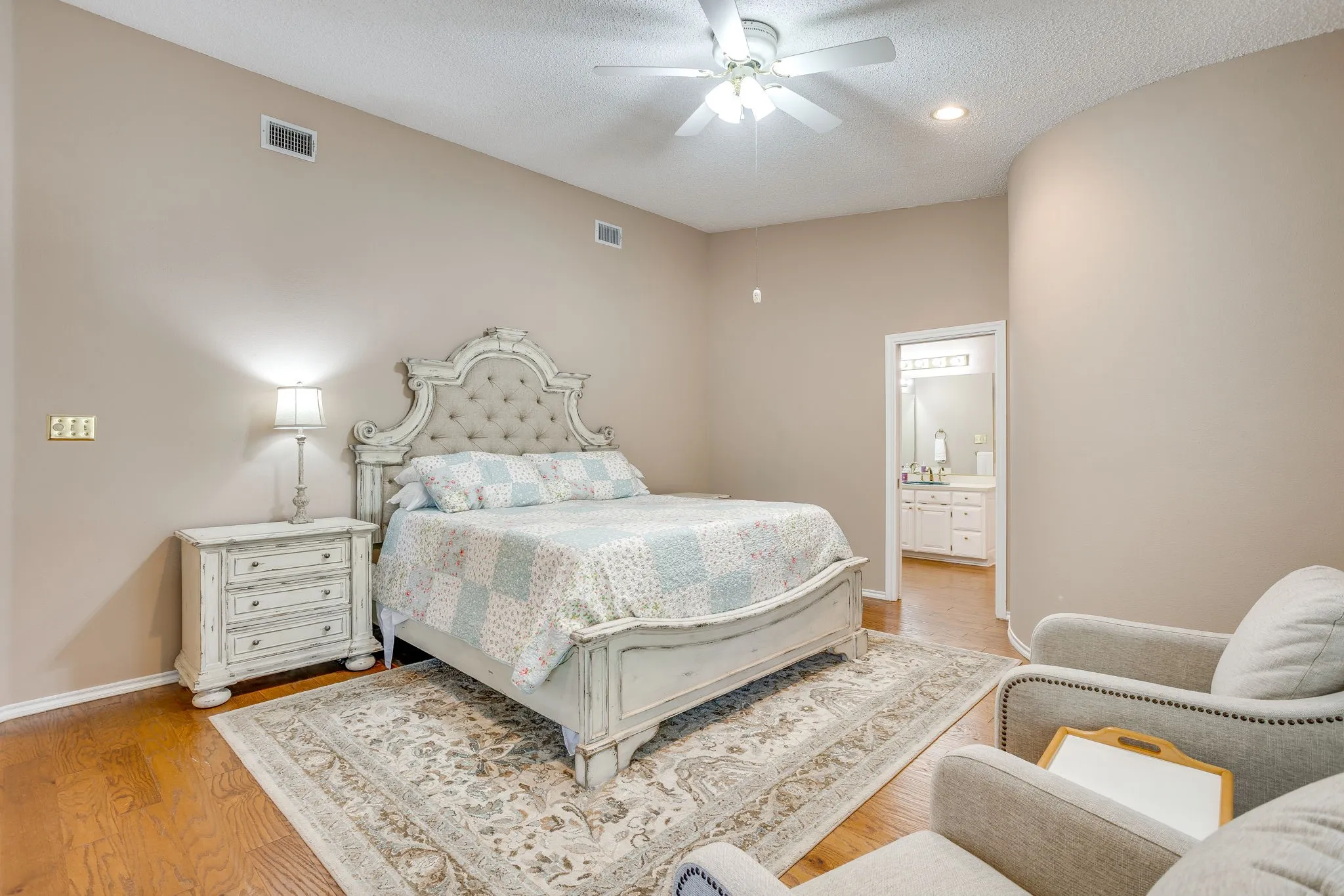 Primary bedroom w/ access to back porch