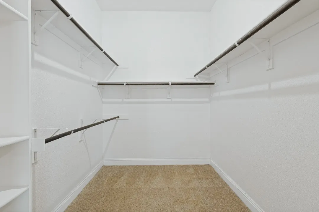 Huge walk-in primary closet, plenty of storage space