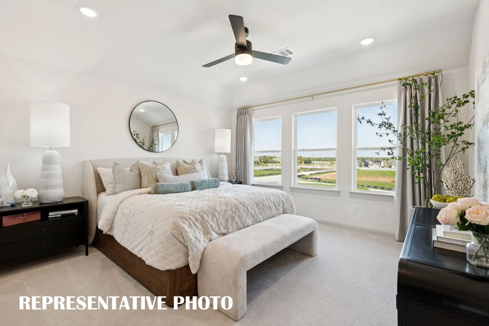Your dreamy new owner's suite is located at the rear of the home for additional privacy.  REPRESENTATIVE PHOTO