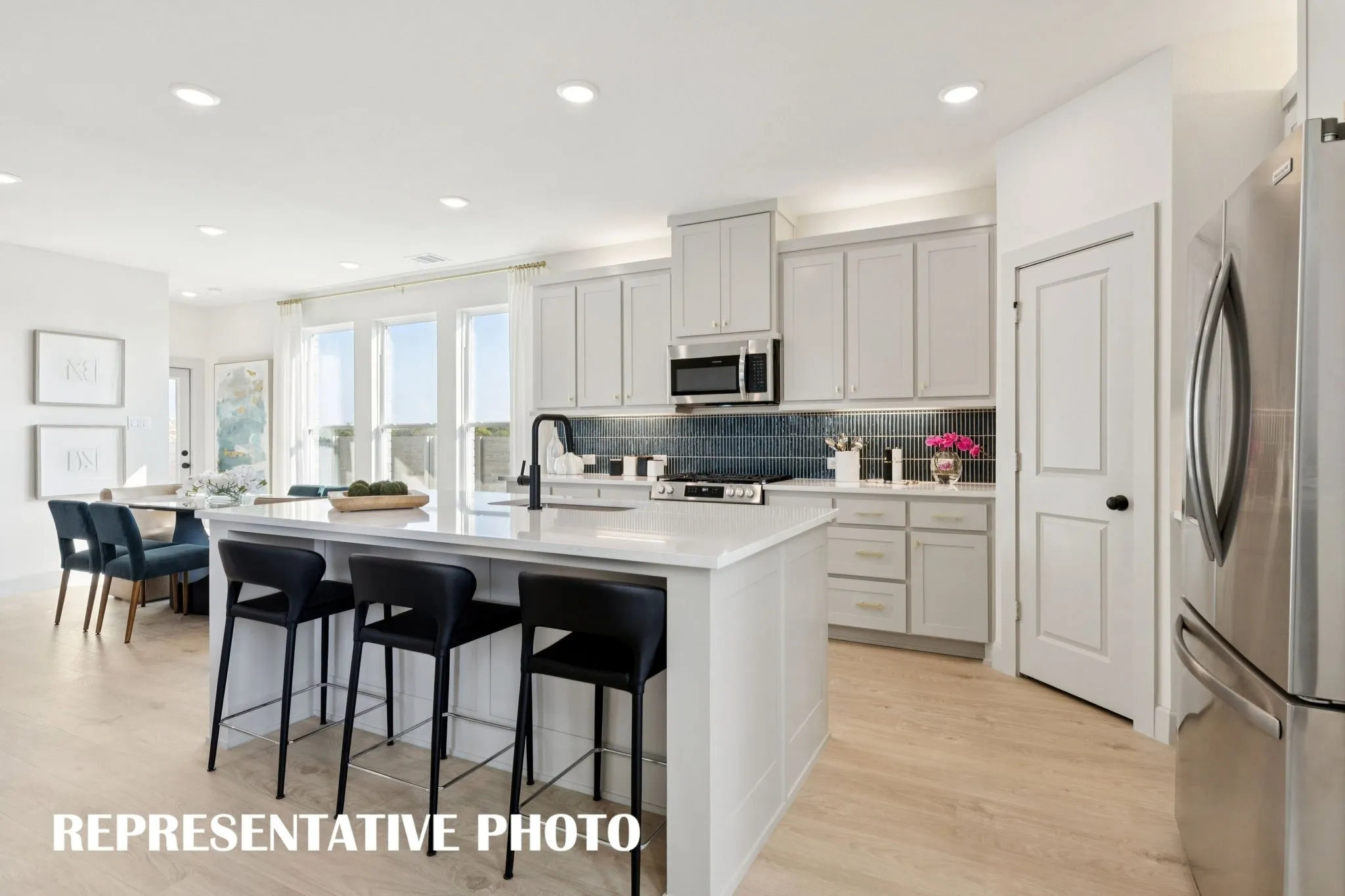 You'll find kitchens with gorgeous color palettes, striking trim and modern stainless steel in our wonderful Bella II plan.  REPRESENTATIVE PHOTO