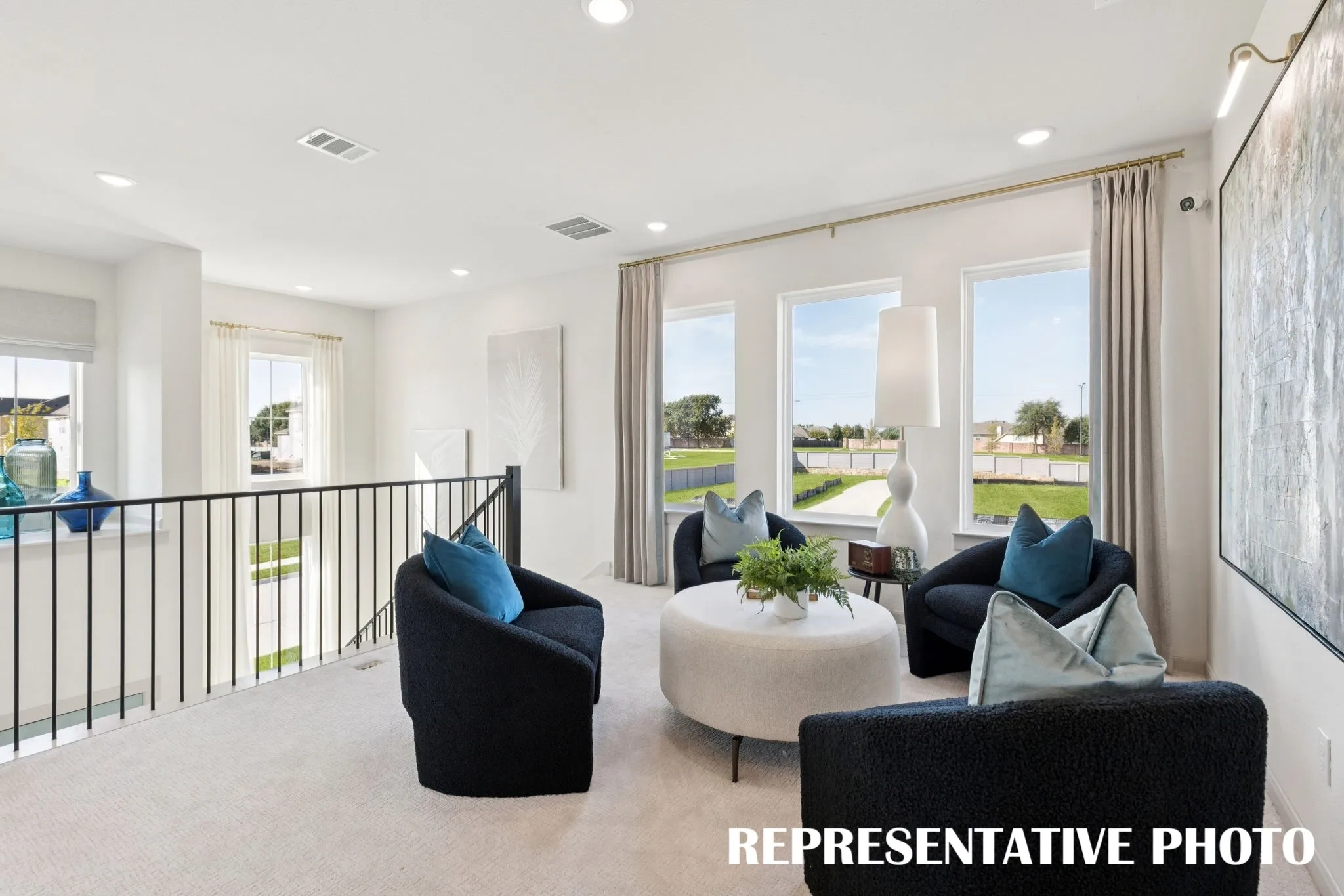 The light filled game room is the perfect place to host those big game day parties!  REPRESENTATIVE PHOTO