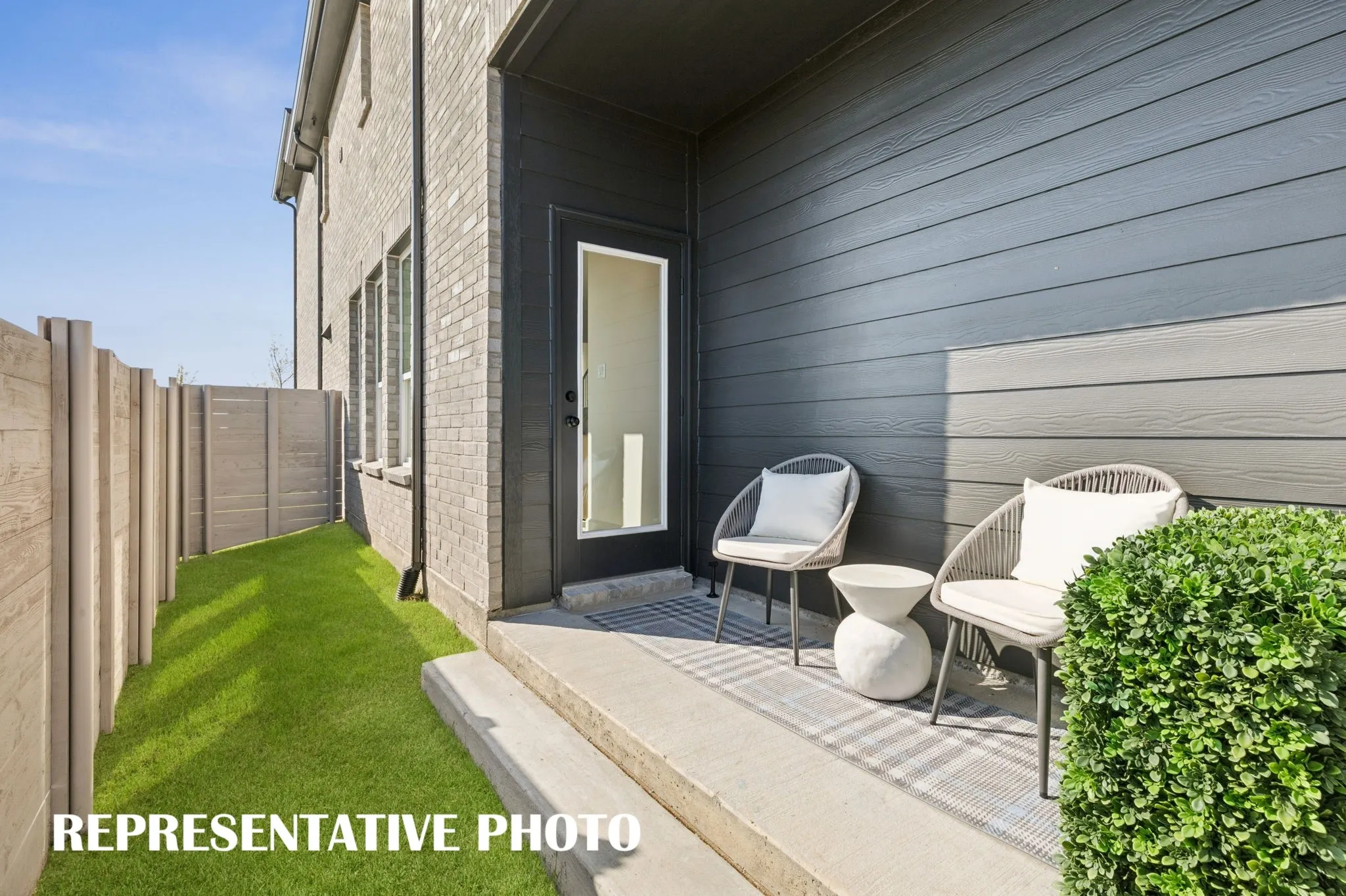 The covered patio offers the perfect place to enjoy morning coffee or to relax and unwind at the end of the day.  REPRESENTATIVE PHOTO