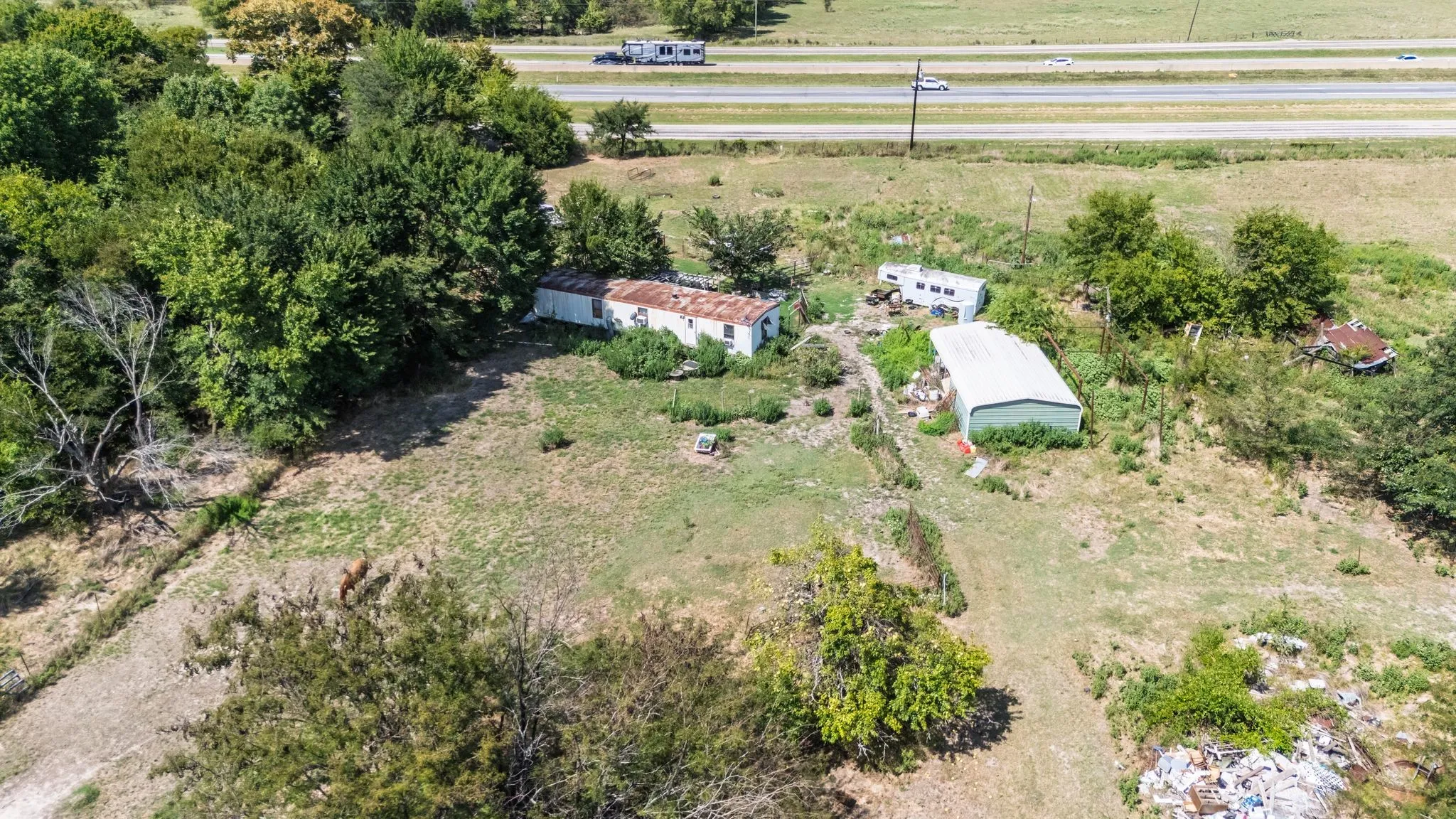 Unimproved Land For Sale in Hunt County , 7081 E Interstate 30, Campbell, Texas 75422, 0, 0, Garage spaces, 0 Sqft, built in 1979, mls#21392703, Real Estate Agent in Campbell, Homes For Sale in Hunt county, Homes For Sale in Campbell, Realtor in Campbell Texas, Real Estate Brokerage Independent Realty Texas, Luminita Cordes Realtor