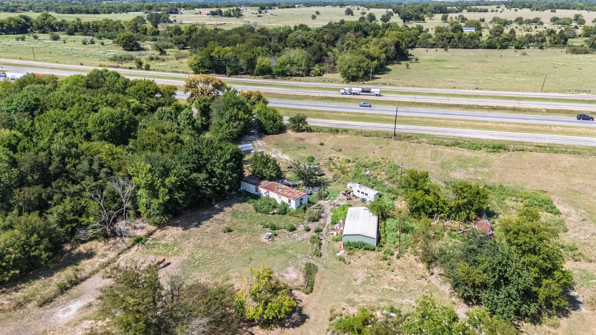 Unimproved Land For Sale in Hunt County , 7081 E Interstate 30, Campbell, Texas 75422, 0, 0, Garage spaces, 0 Sqft, built in 1979, mls#21392703, Real Estate Agent in Campbell, Homes For Sale in Hunt county, Homes For Sale in Campbell, Realtor in Campbell Texas, Real Estate Brokerage Independent Realty Texas, Luminita Cordes Realtor