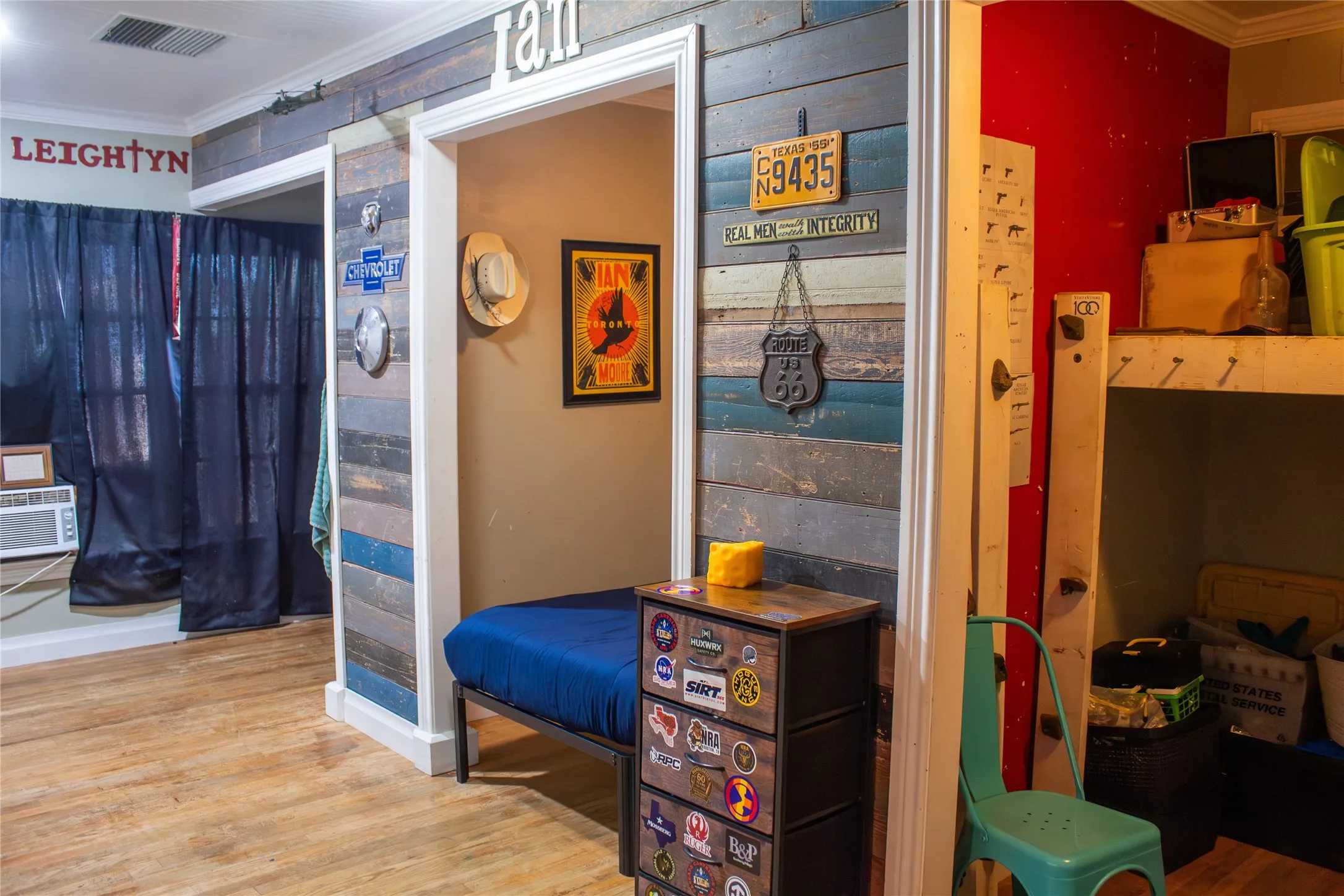 Wood-finish flooring throughout, with a decorative shiplap accent wall