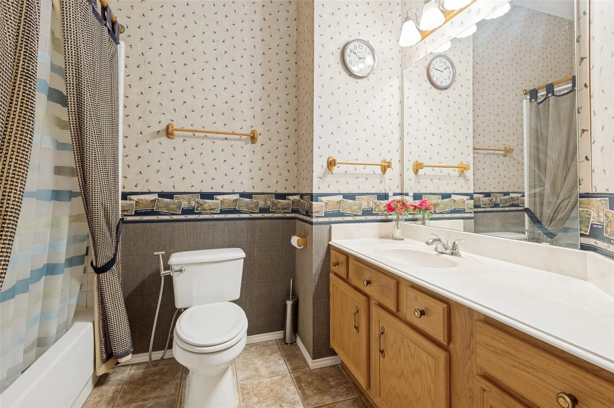 Spacious vanity with an integrated sink and wood-finish cabinetry