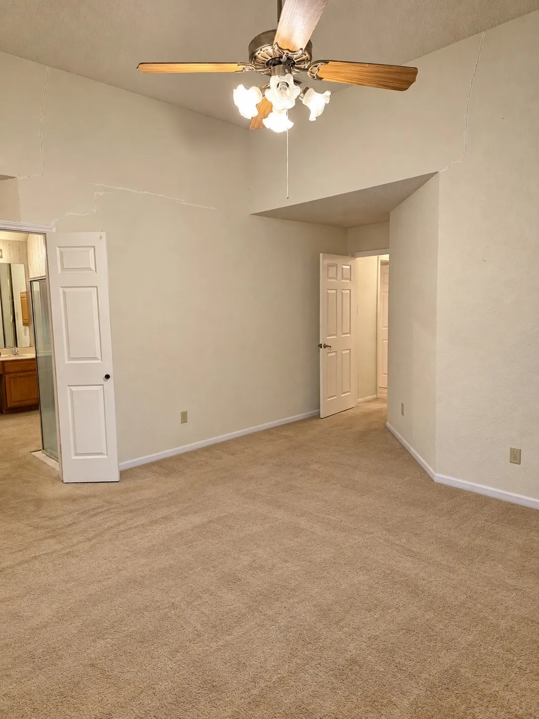 Primary Bedroom - VIRTUALLY DECLUTTERED USING AI