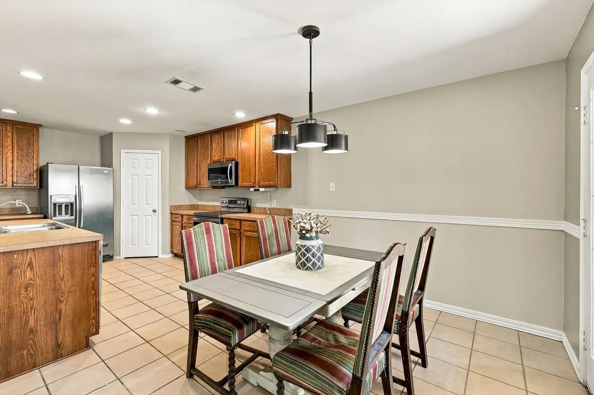 Dining area and chandelier.