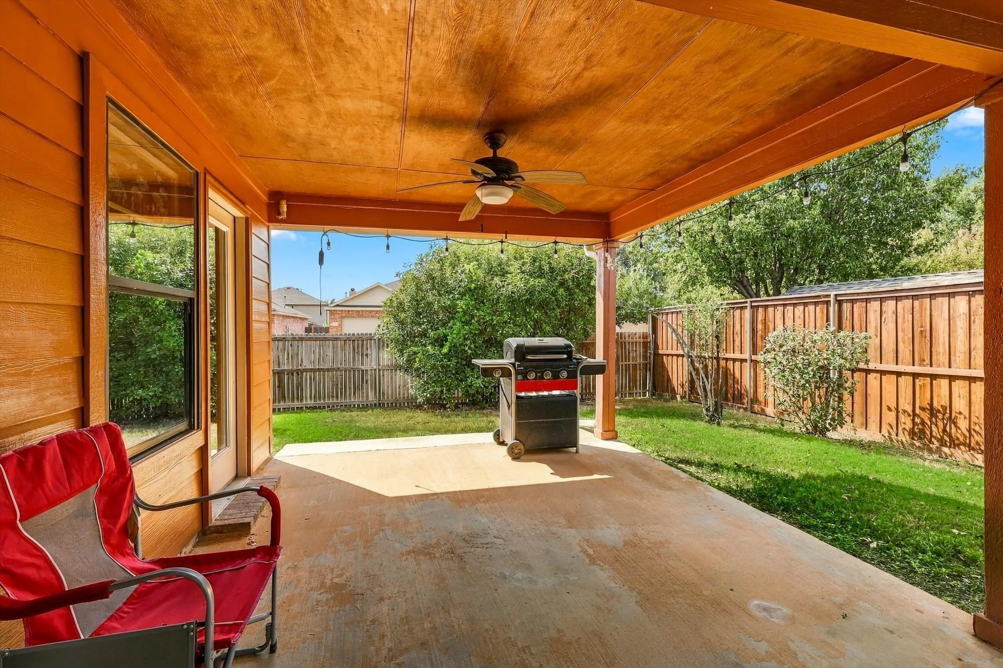 Extended patio and ceiling fan.