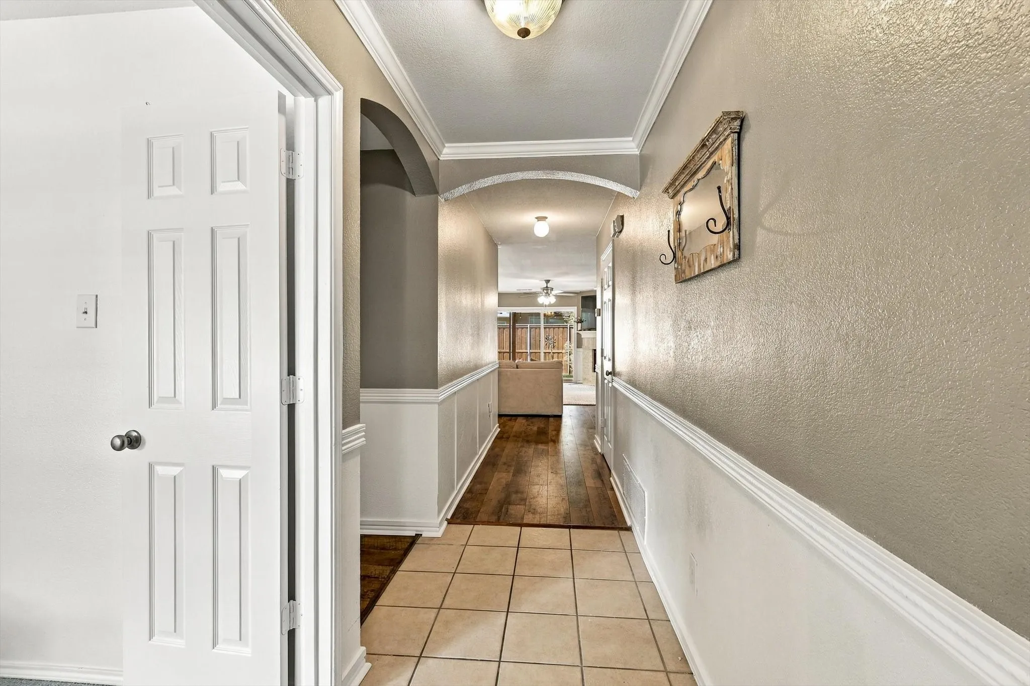 Hallway to additional bedroom and living.