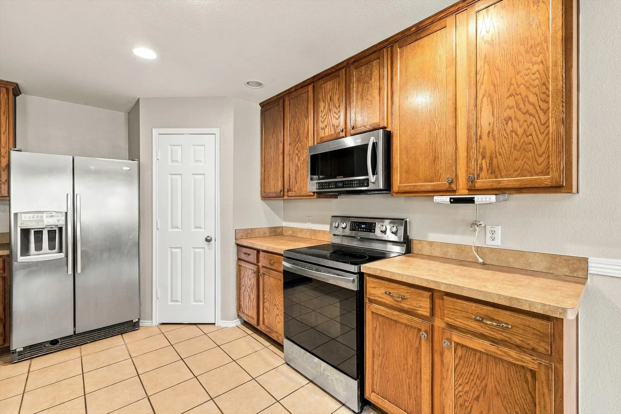 Electric range and built in microwave.