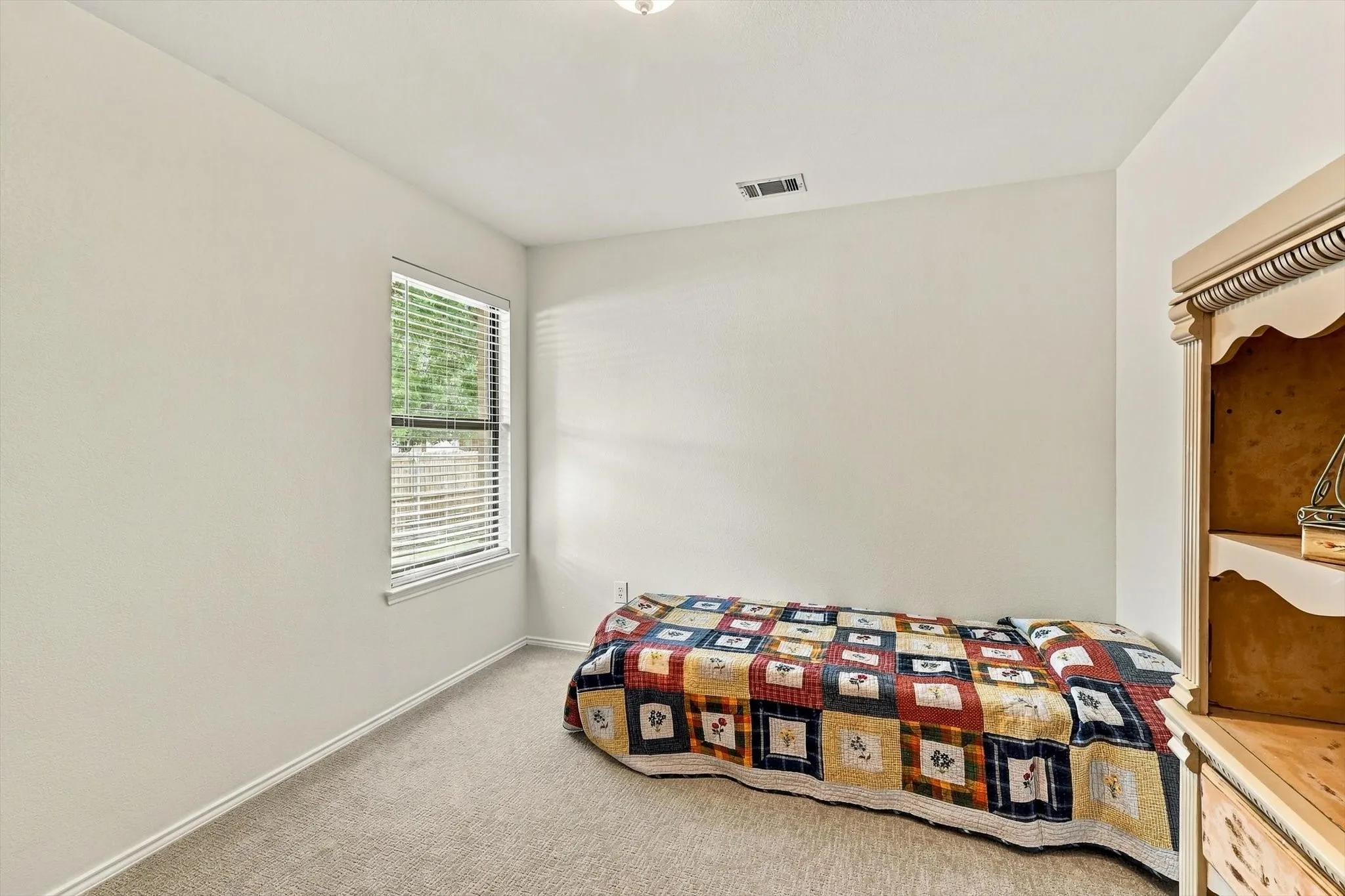 Bedroom with walk in closet.