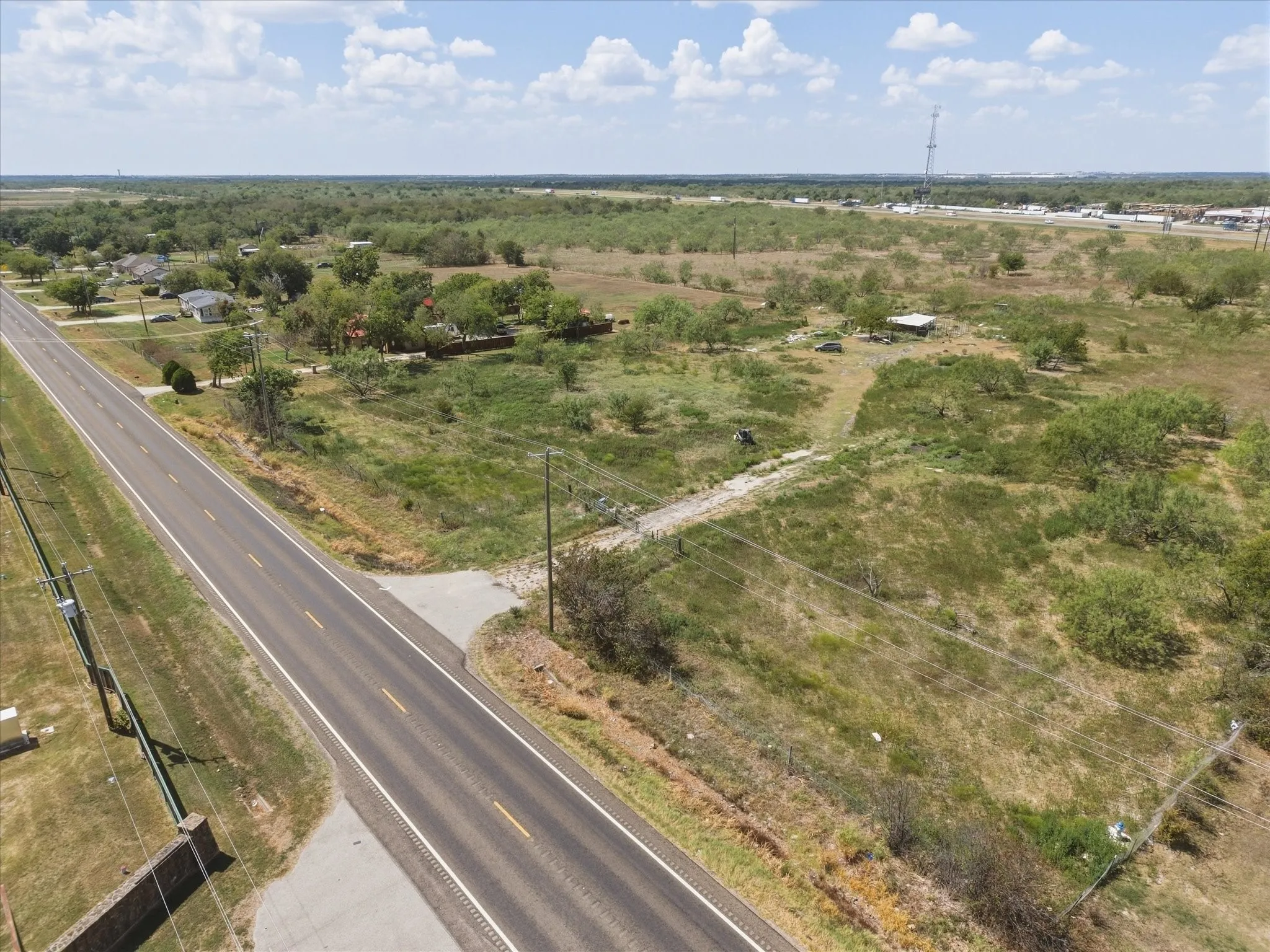 Entrance off FM 148 (viewing South) - 16" City Water along frontage