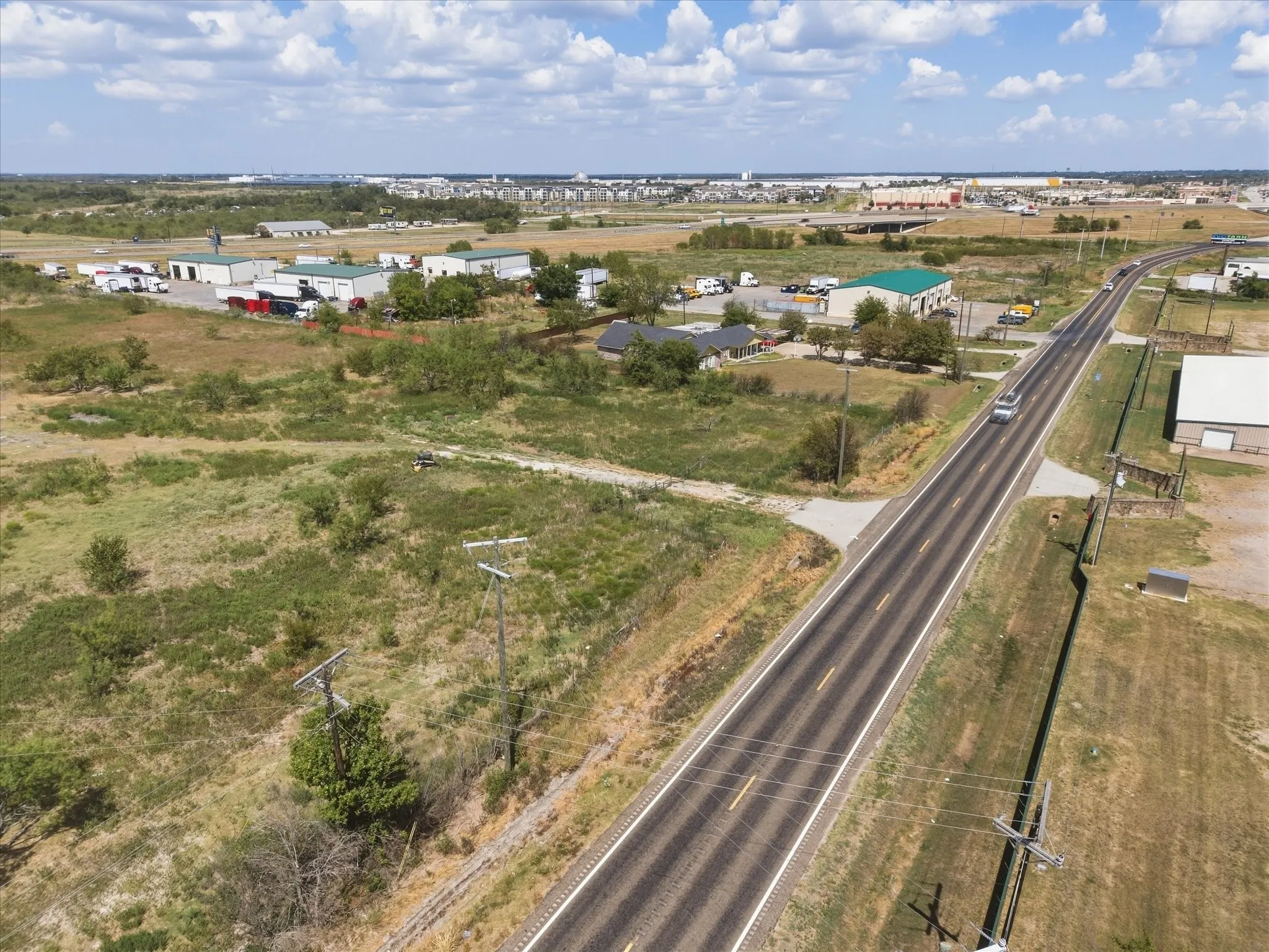 Entrance off FM 148 (viewing North) - 16" City Water along frontage