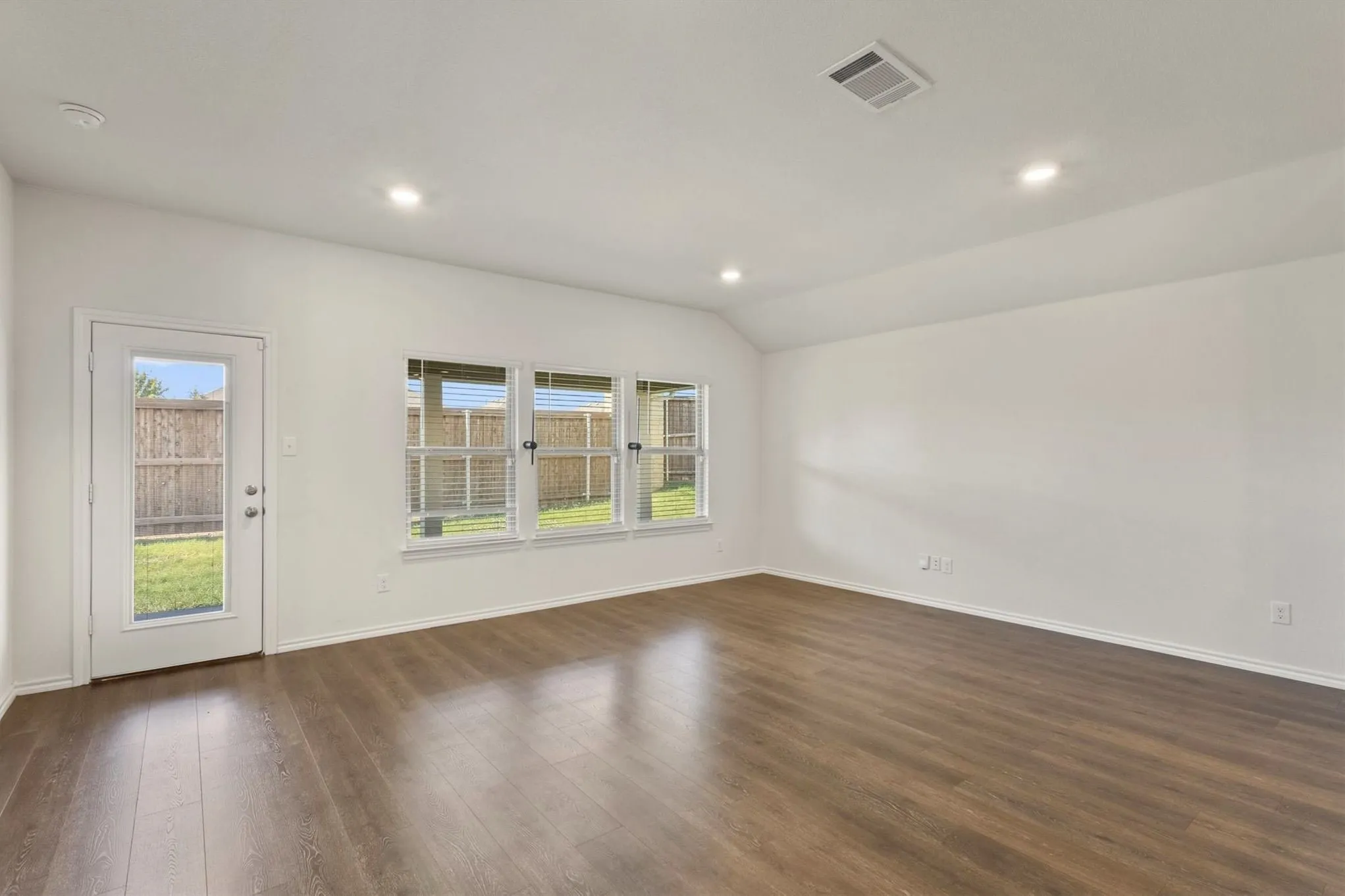 Wood-finish flooring with white walls