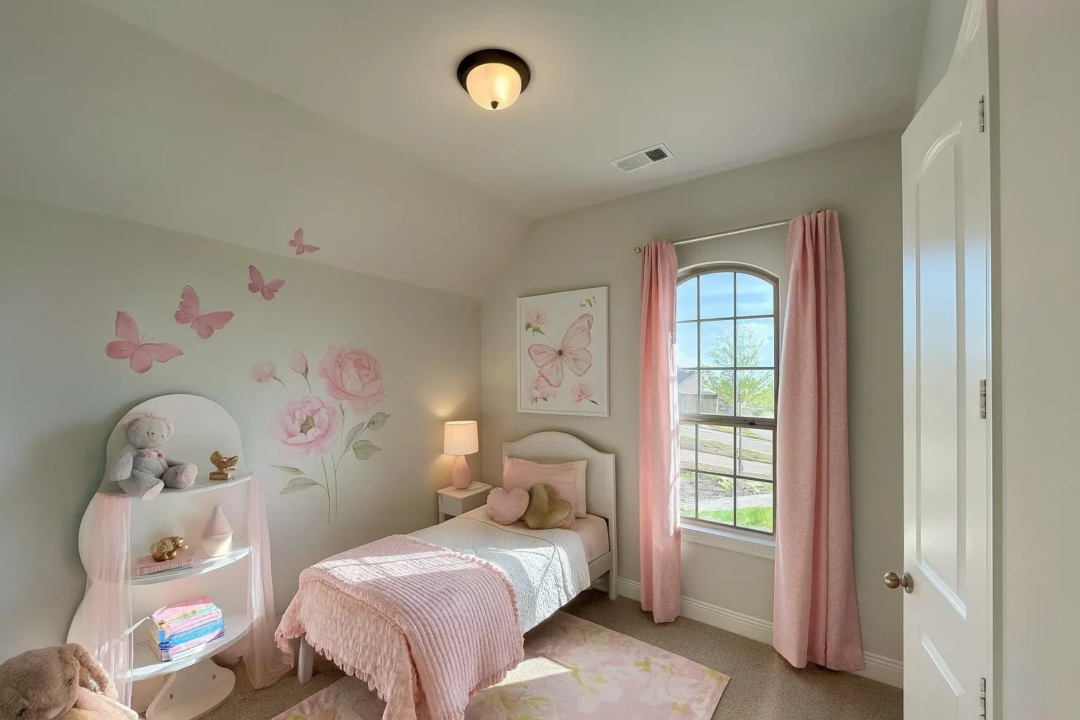 Arched window with gridded pane, vaulted ceiling, built-in light fixture, and neutral wall paint