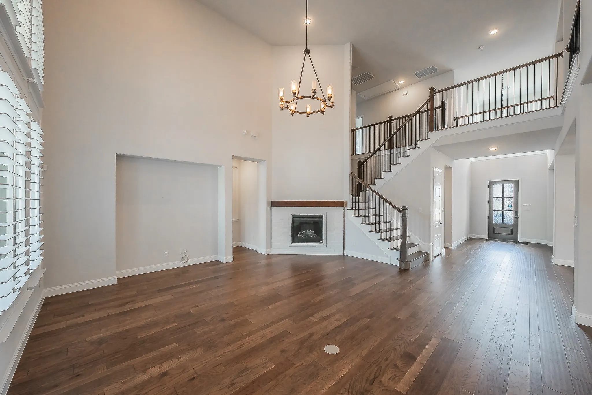 Vaulted ceilings and wood-finish flooring