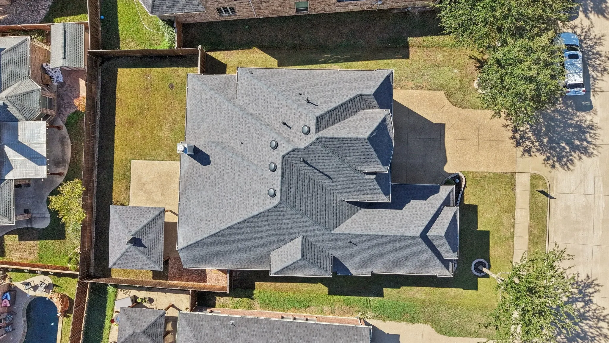 Gabled roofline with dark gray shingles