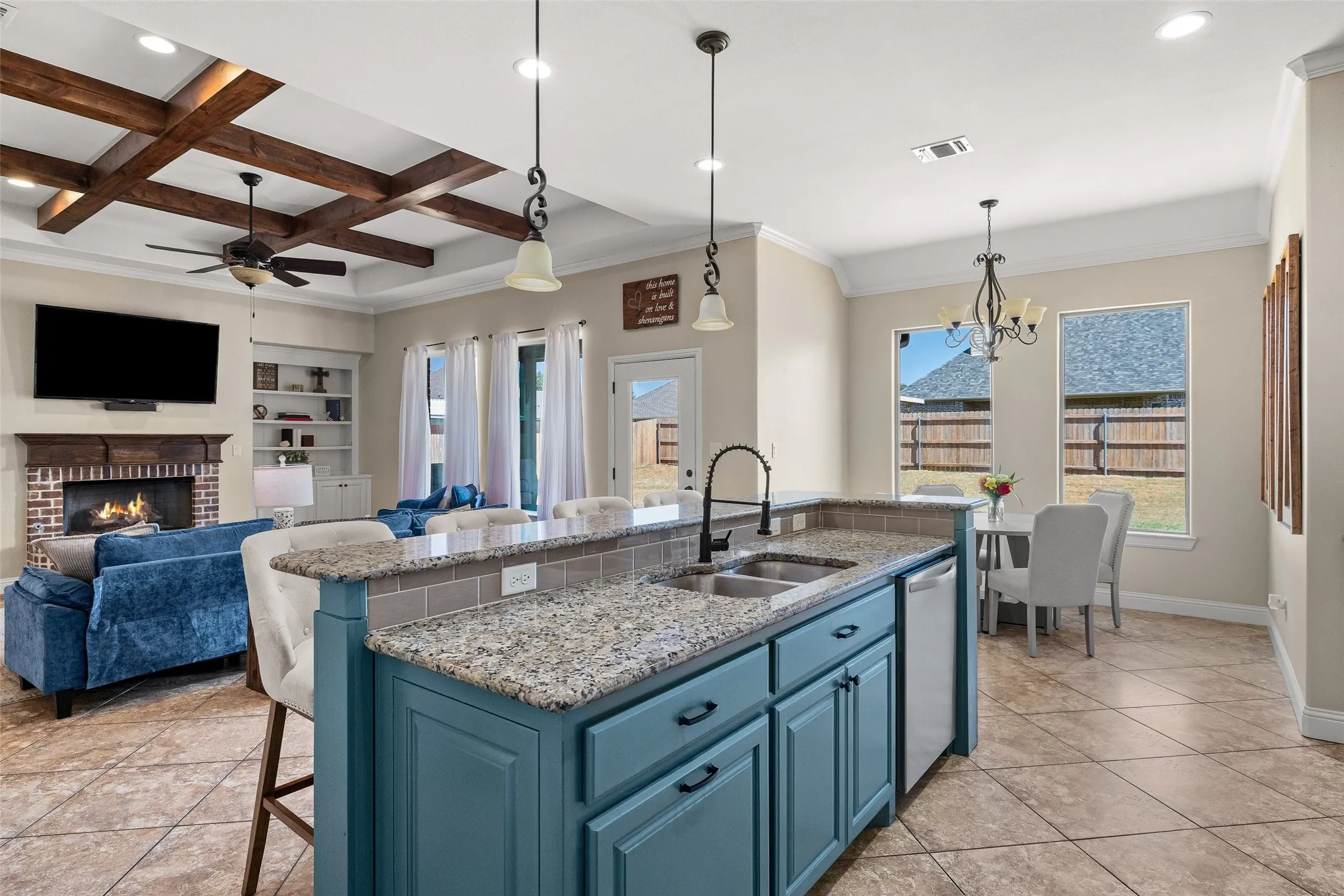 Kitchen island with granite countertop and double stainless steel sink