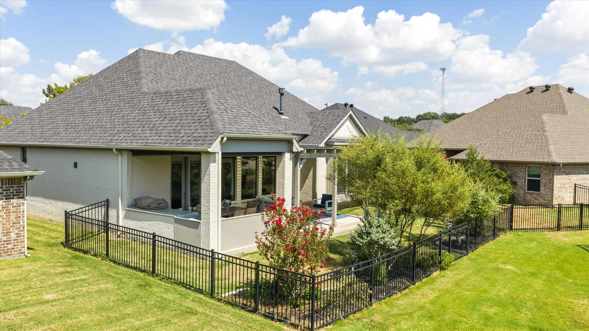 Covered patio with a high ceiling