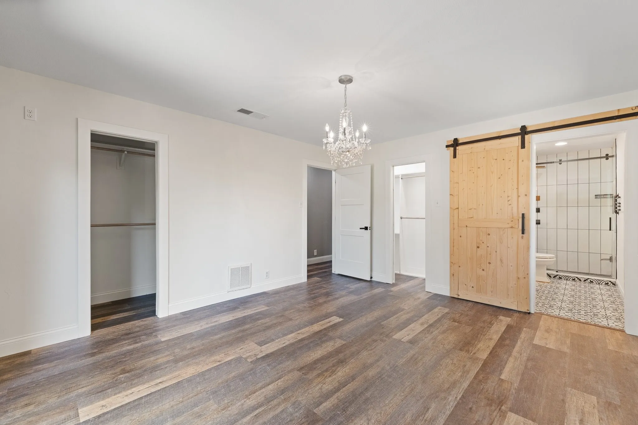 The primary bedroom is equipped with 2 CLOSETS and an ensuite bathroom!