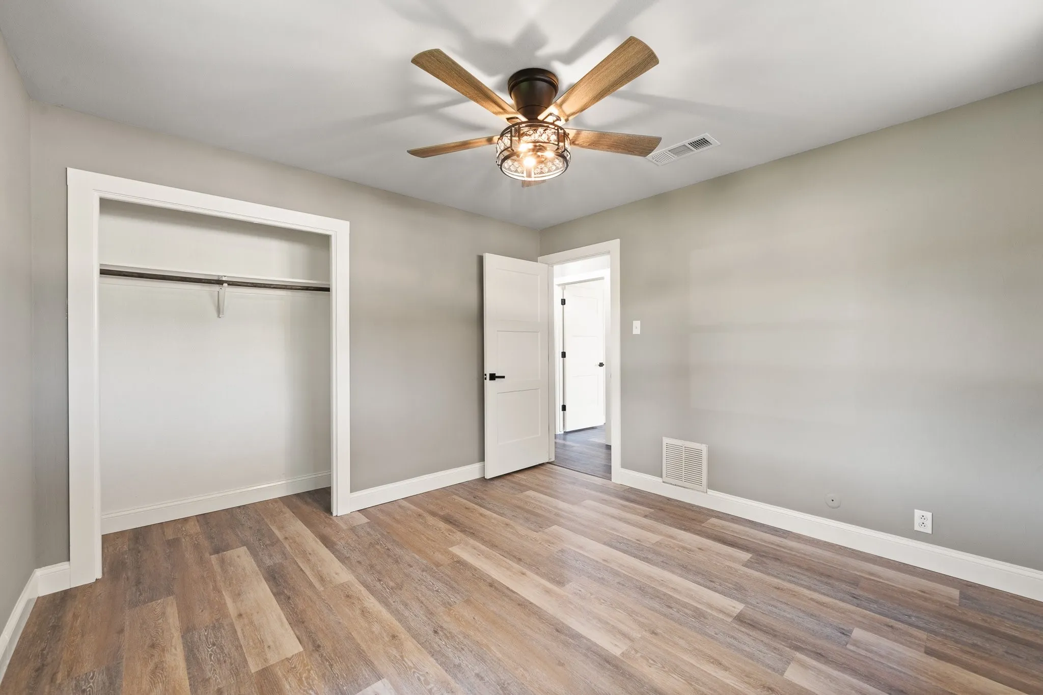 Secondary bedroom #2. NEW FLOORING & CEILING FAN!