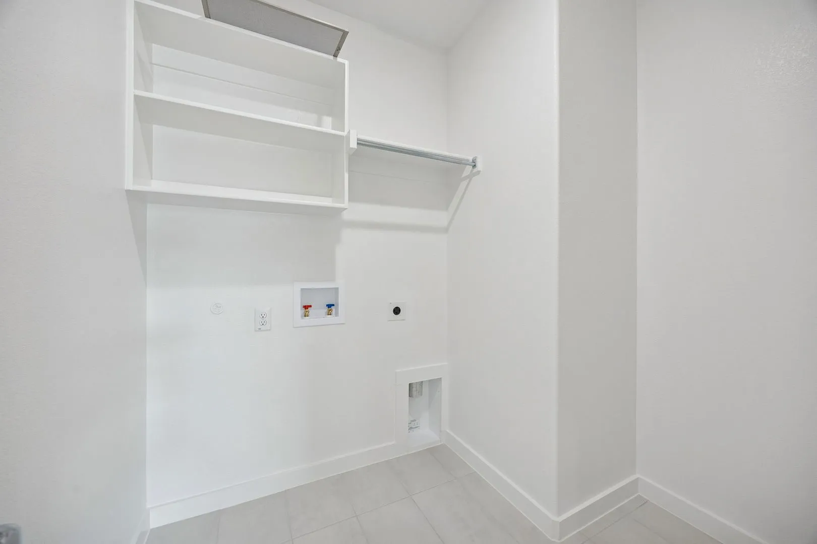 Utility Room in the Masters home plan by Trophy Signature Homes – REPRESENTATIVE PHOTO