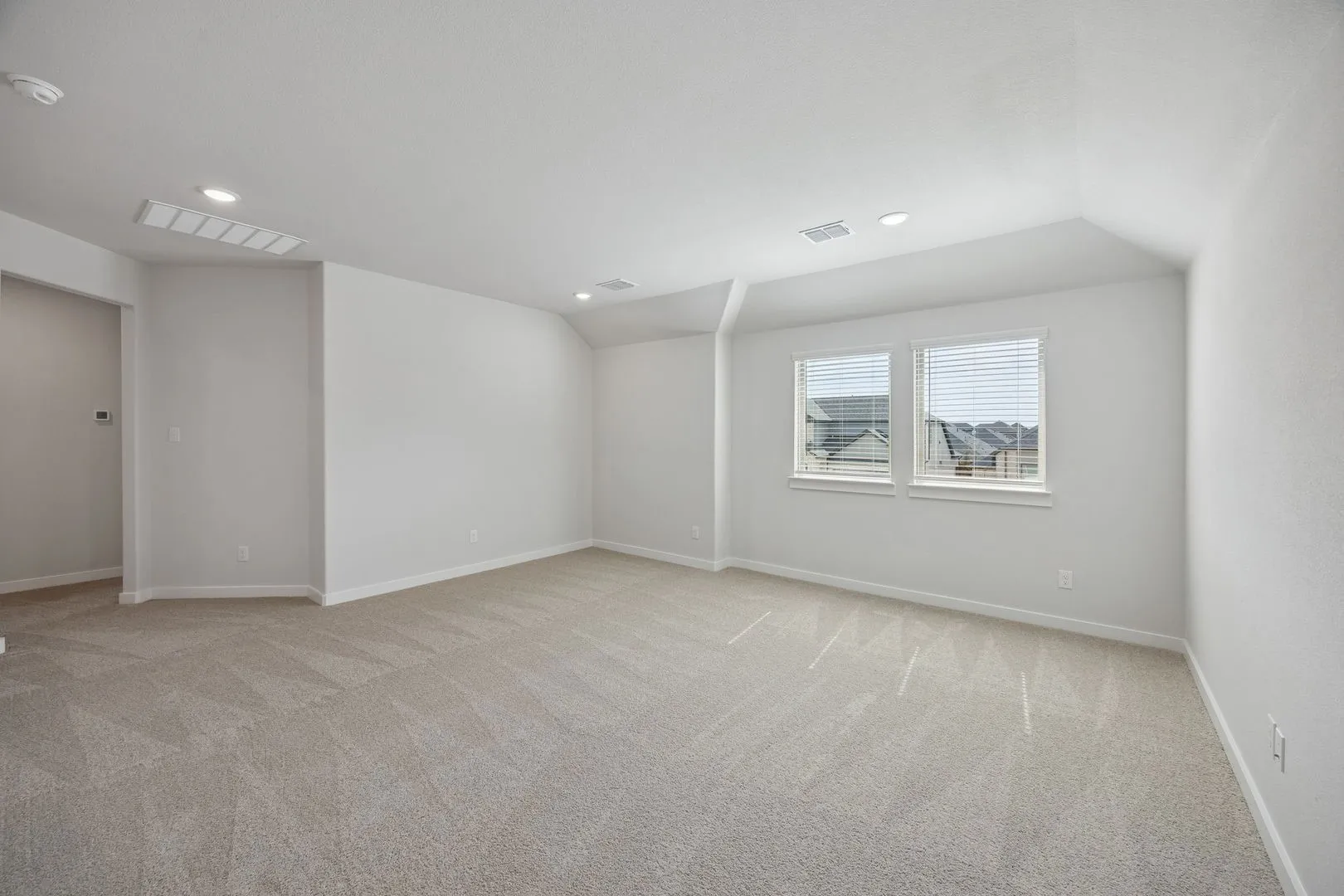 Game room in the Masters home plan by Trophy Signature Homes – REPRESENTATIVE PHOTO