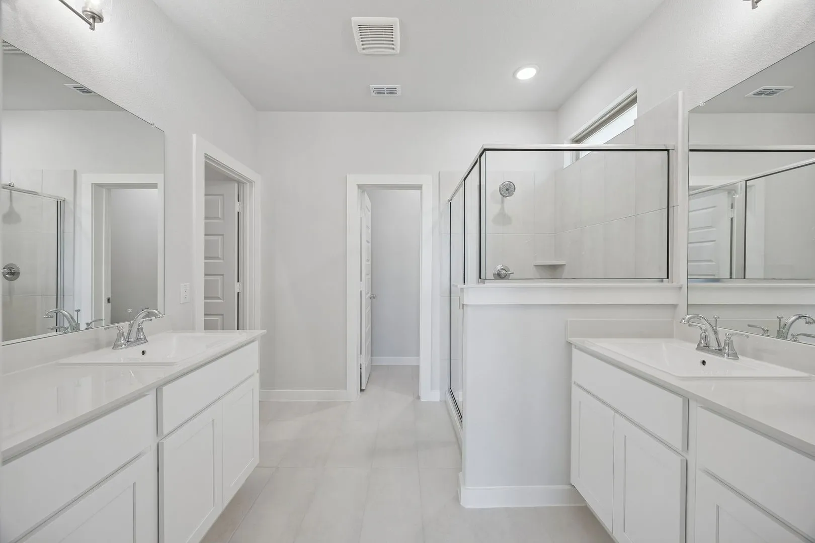 Primary Bathroom in the Masters home plan by Trophy Signature Homes – REPRESENTATIVE PHOTO