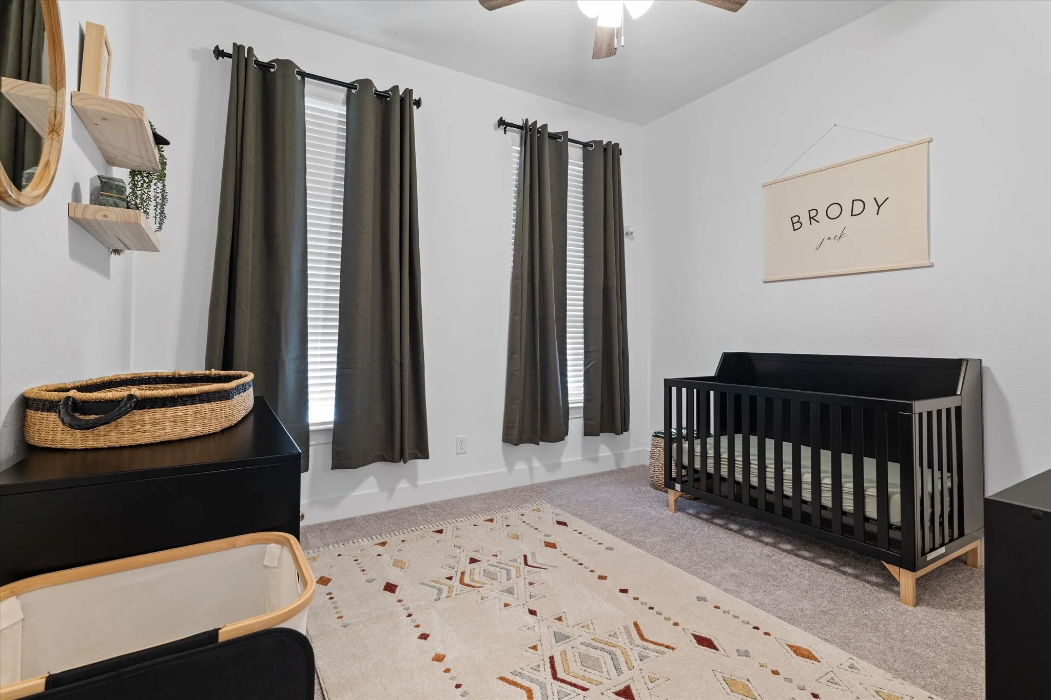 Recessed lighting, ceiling fan, two windows with blinds, and light-toned wall paint