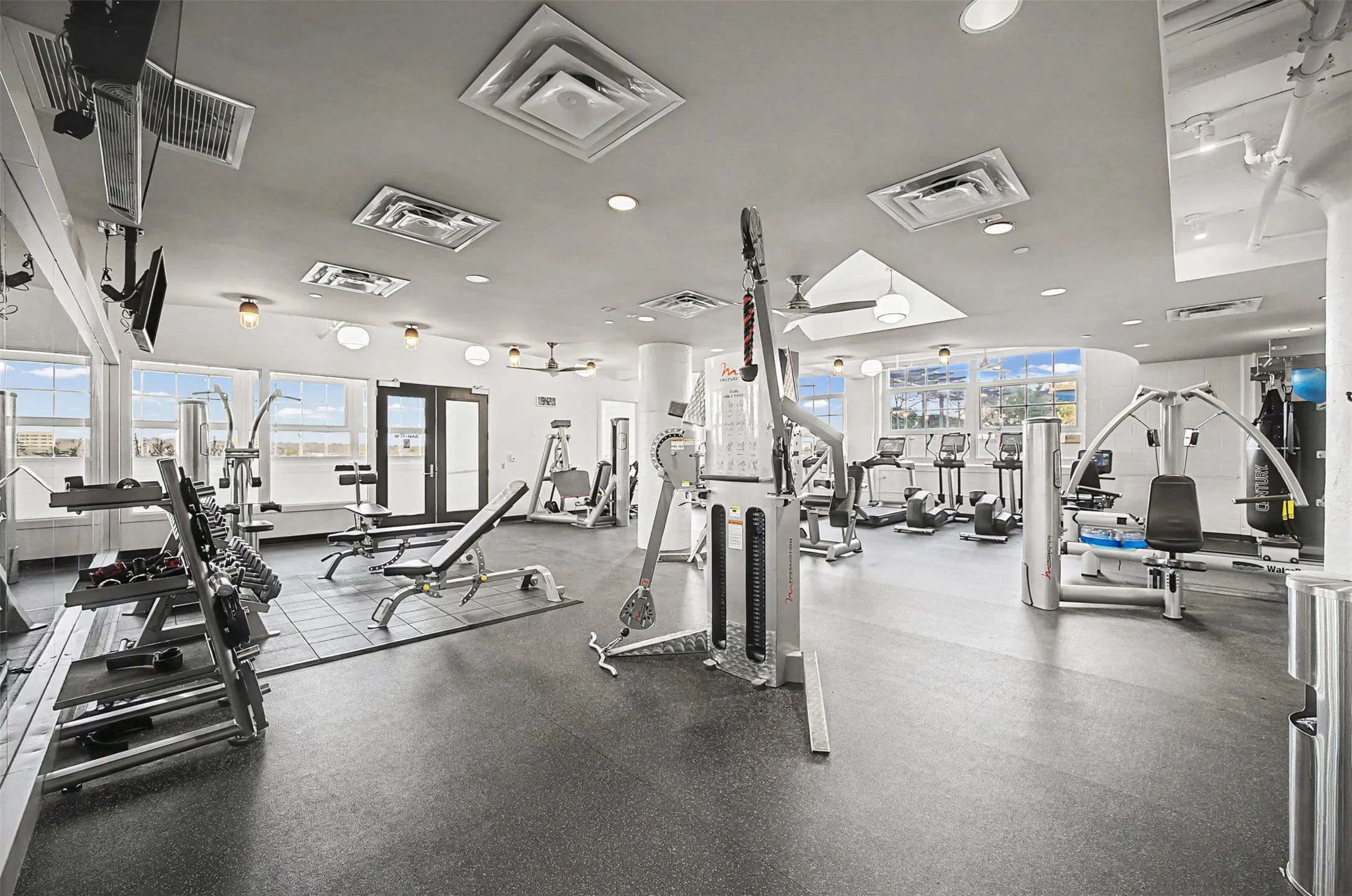Workout area featuring recessed lighting