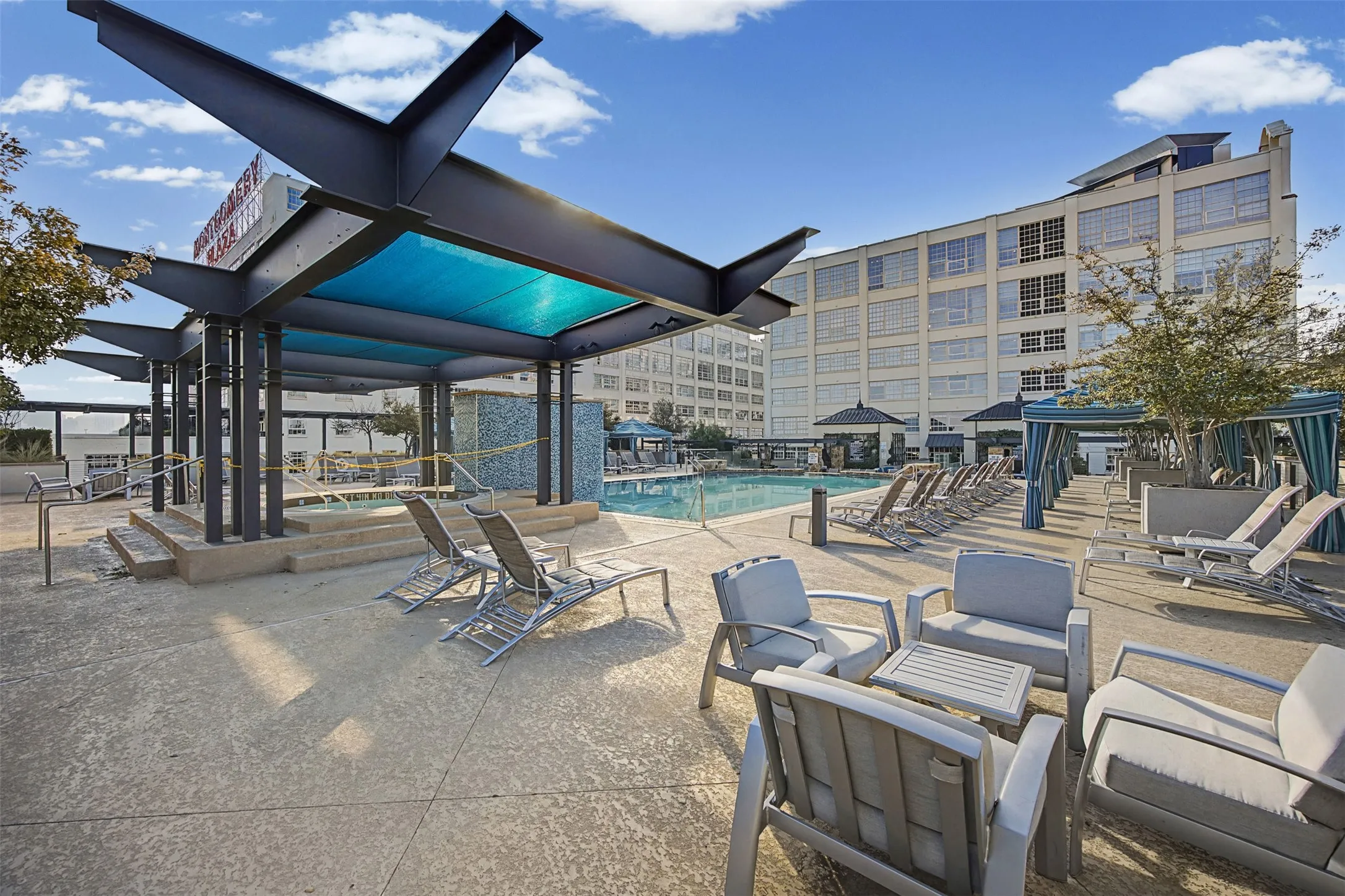 View of patio featuring a community pool