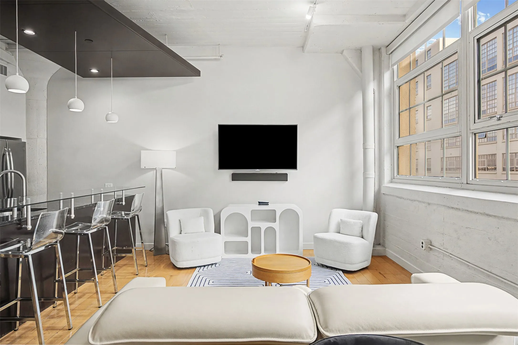Living room featuring light wood-style flooring