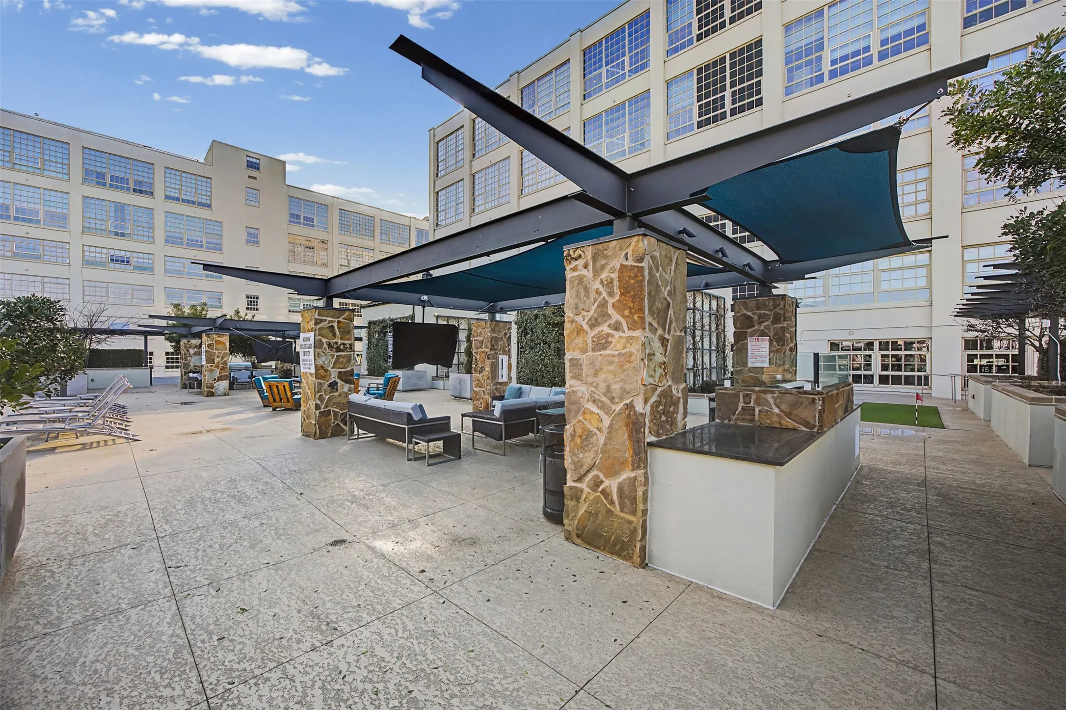 View of patio with an outdoor living space