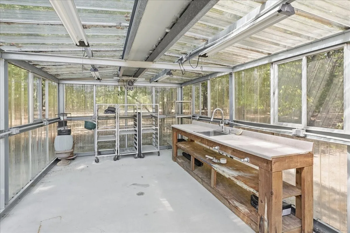 Green House with heater, lights, floor drains and racks