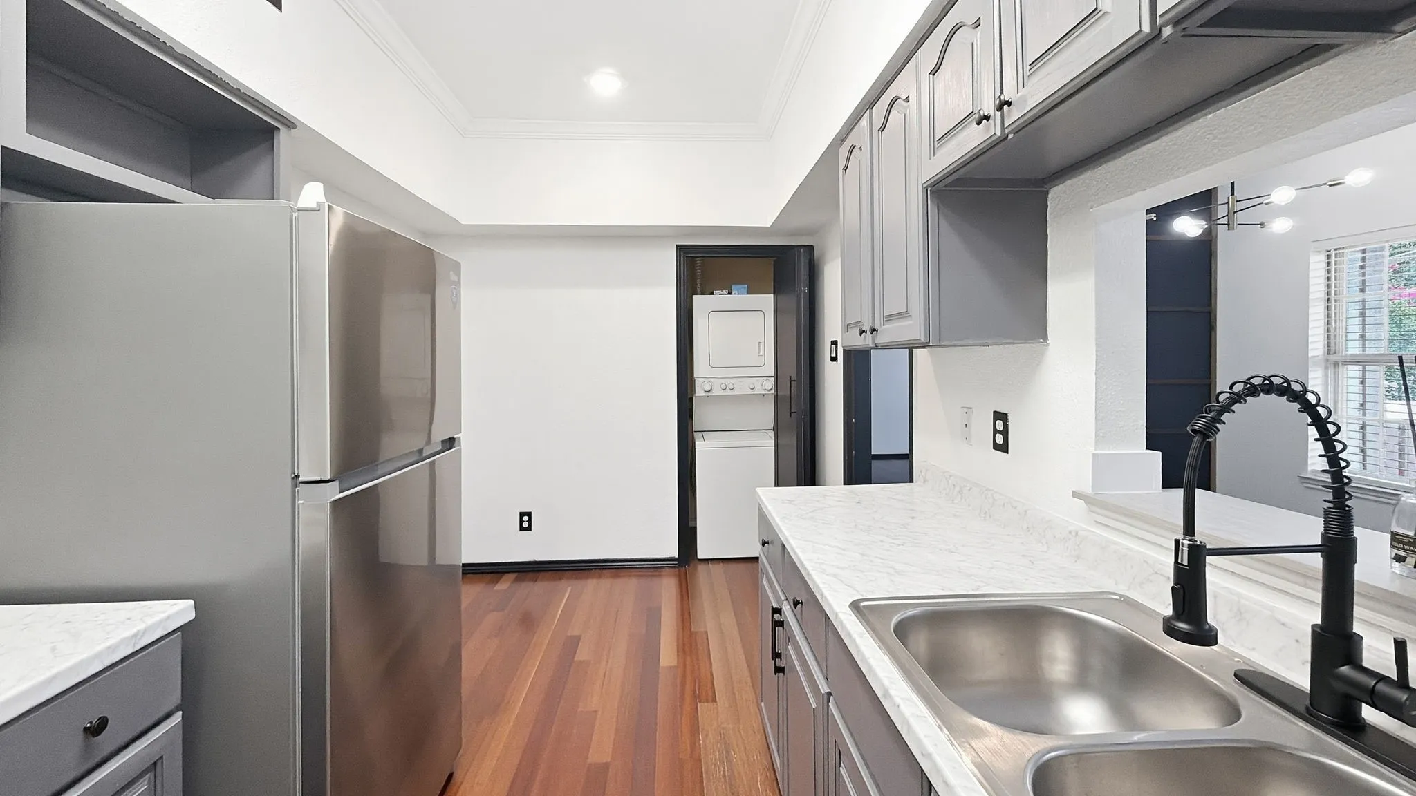 Primary bedroom had door to balcony.  Virtually staged.