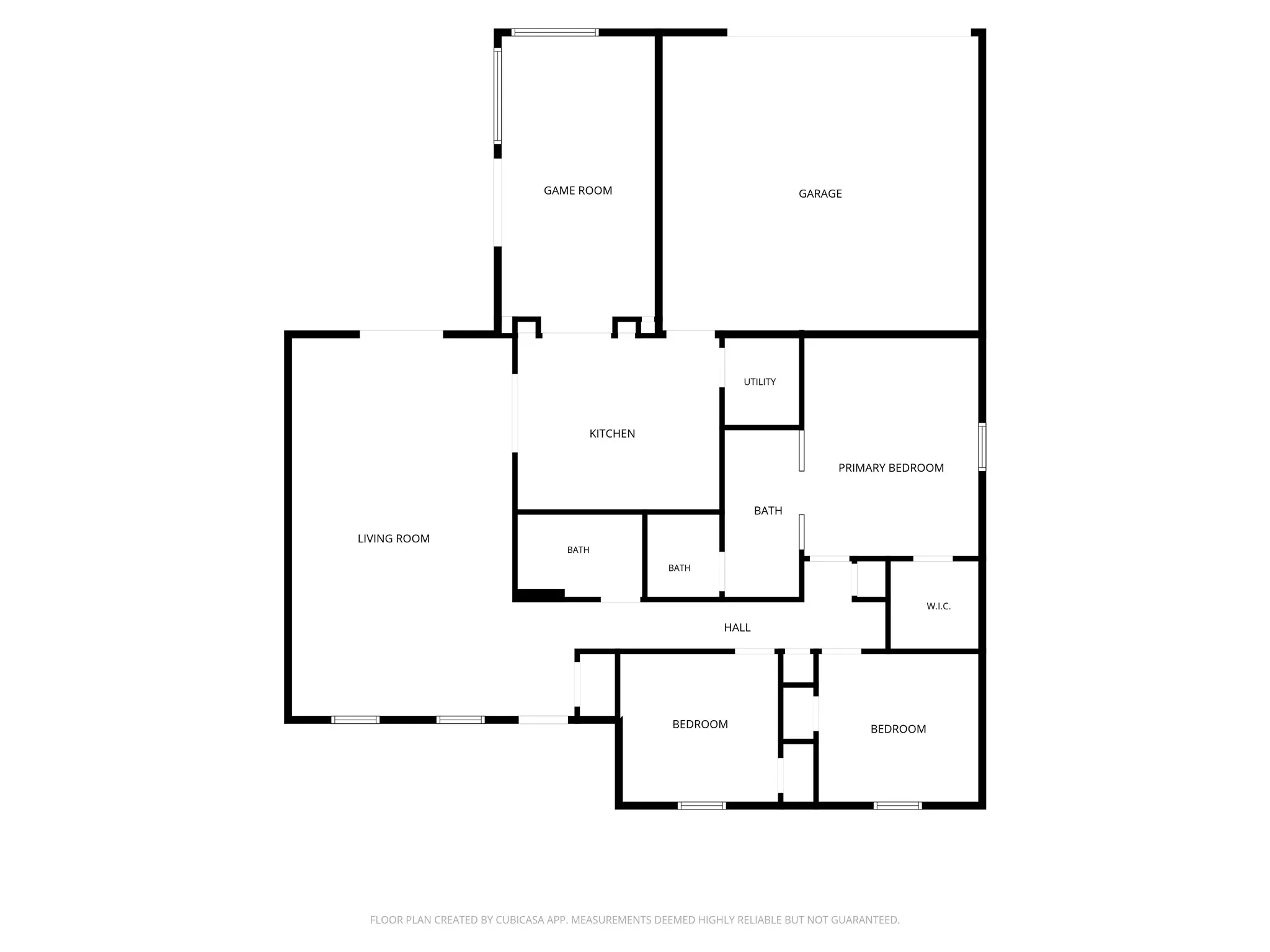 Wood-finish flooring, ceiling fan, white window trim, and white balusters