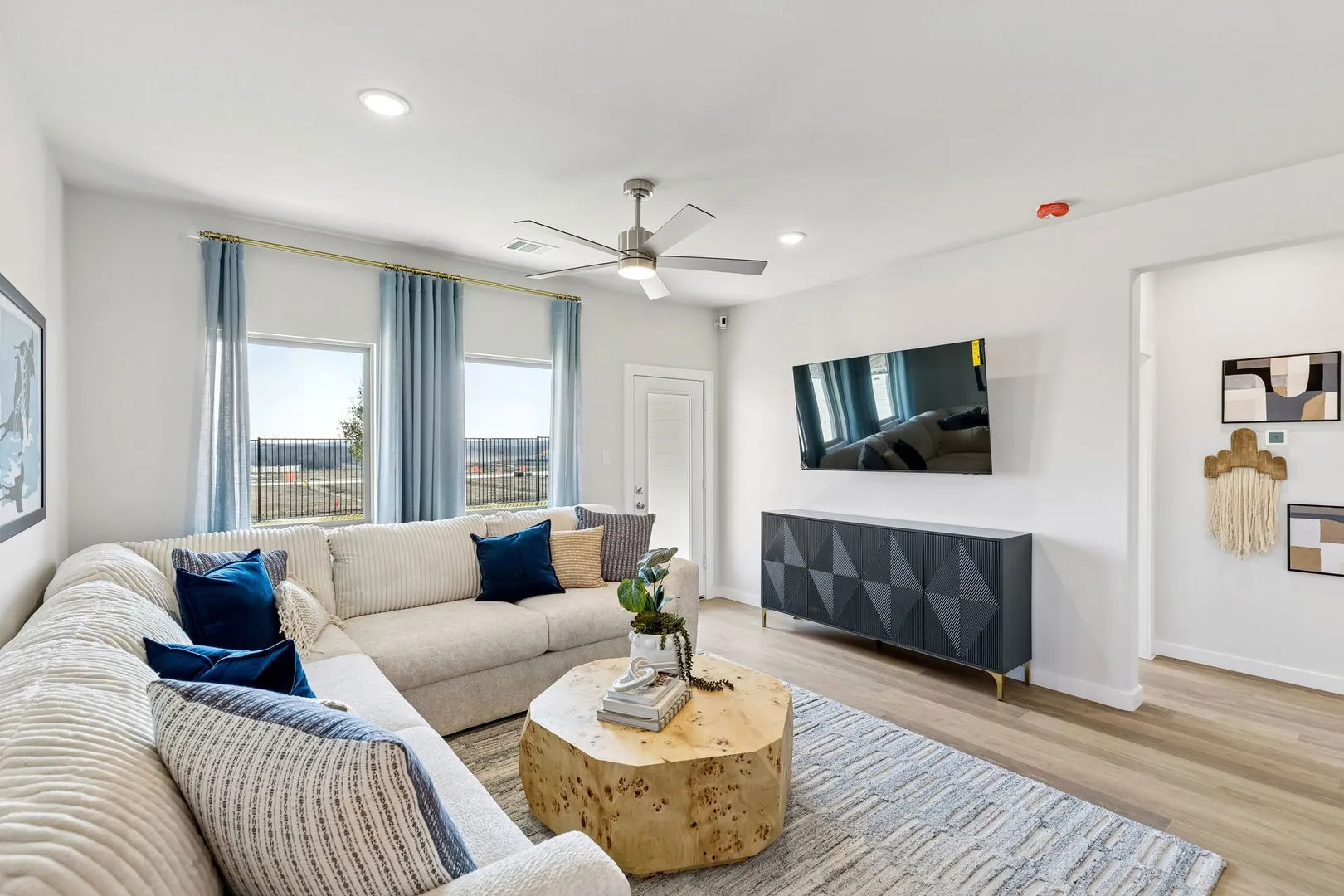 Living Room in the Magnolia home plan by Trophy Signature Homes – REPRESENTATIVE PHOTO