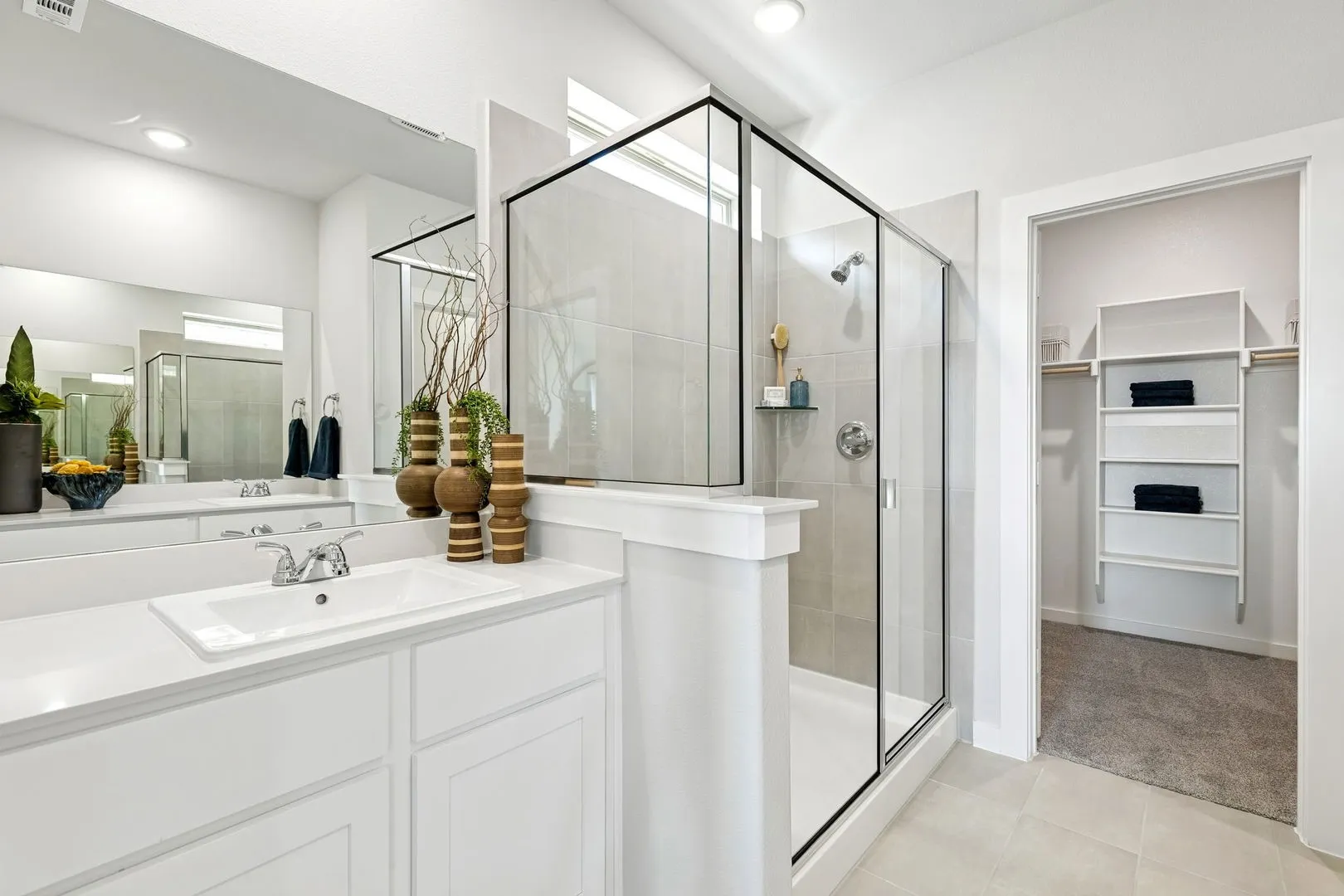 Primary bathroom in the Magnolia home plan by Trophy Signature Homes – REPRESENTATIVE PHOTO