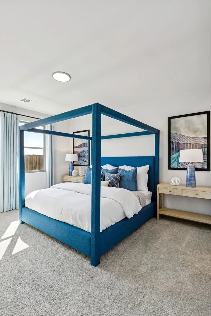 Primary bedroom in the Magnolia home plan by Trophy Signature Homes – REPRESENTATIVE PHOTO