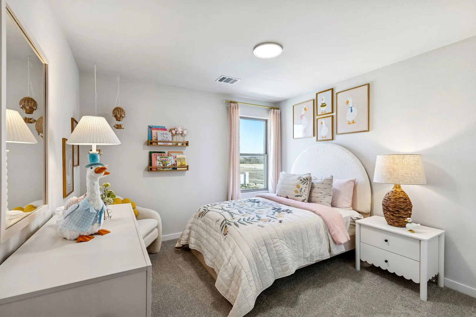 Secondary bedroom in the Magnolia home plan by Trophy Signature Homes – REPRESENTATIVE PHOTO